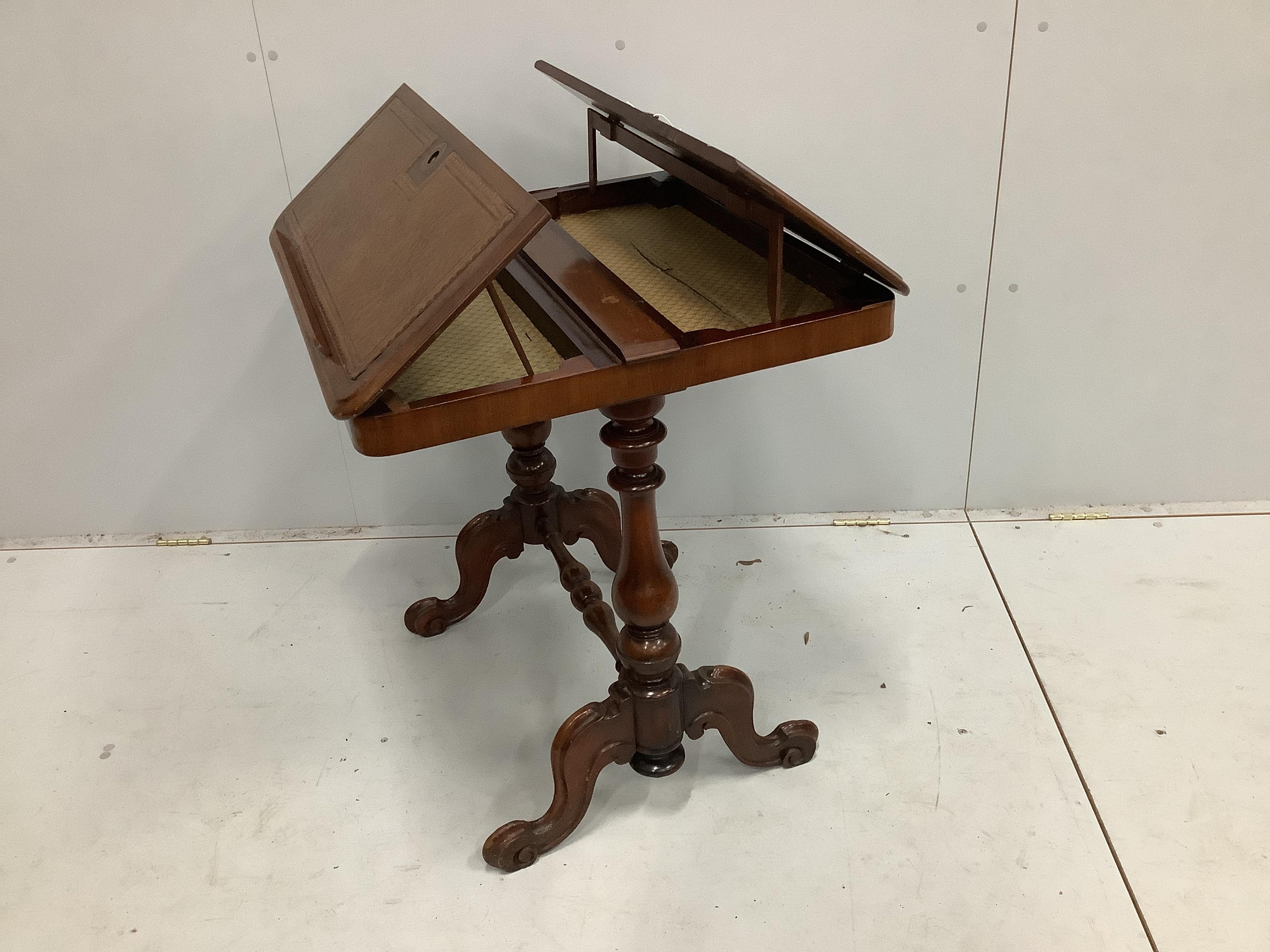 A reproduction Victorian style mahogany reading table with twin hinged flap top, width 70cm, depth 64cm, height 72cm                                                                                                        