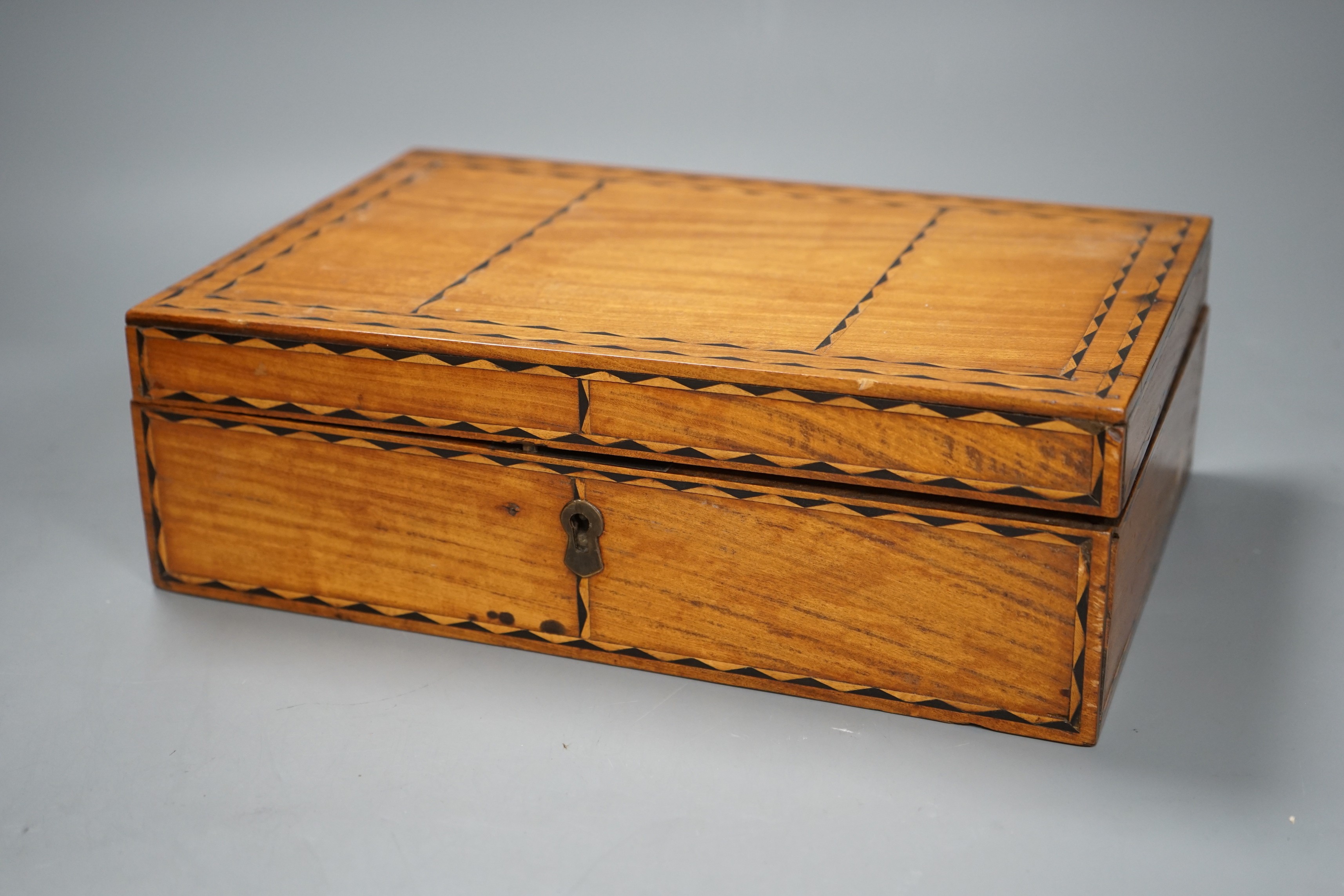 A 19th century inlaid satinwood work box, 29cm wide                                                                                                                                                                         