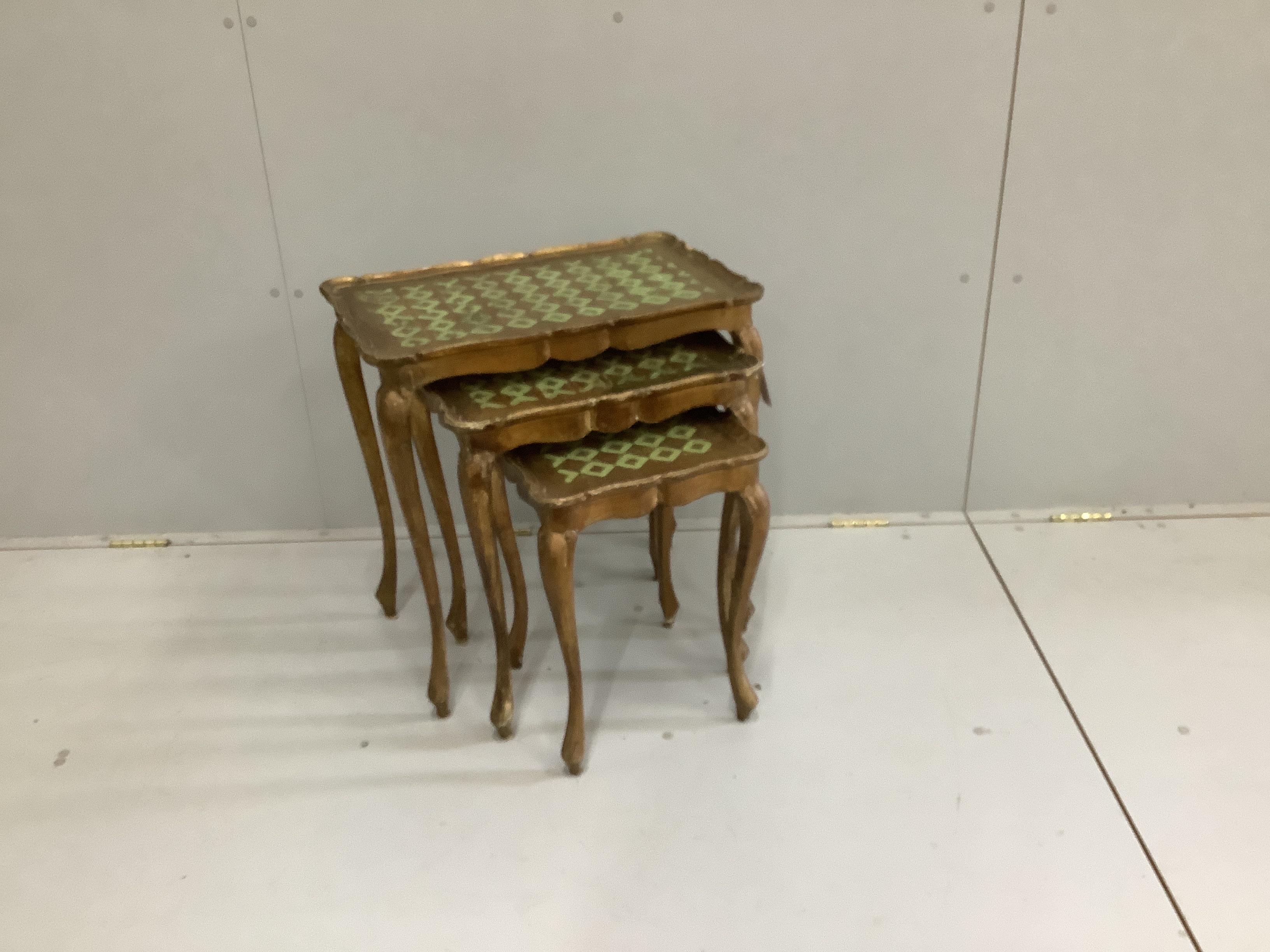A nest of three Italian giltwood tea tables, width 56cm, depth 36cm, height 58cm                                                                                                                                            