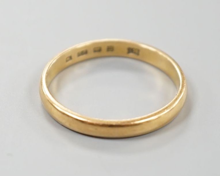 A 22ct yellow gold wedding band, size S, 3.4 grams.                                                                                                                                                                         