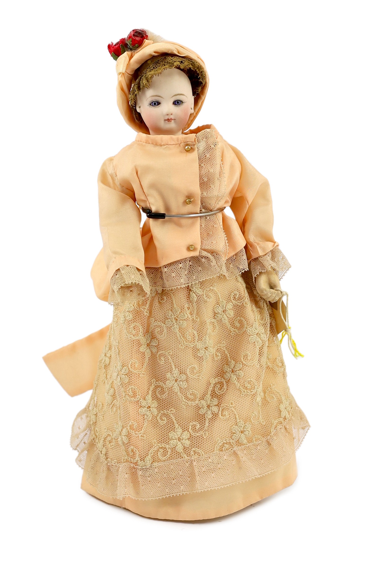 A Madame Barrois swivel-headed bisque doll, French, circa 1880, 11in.                                                                                                                                                       