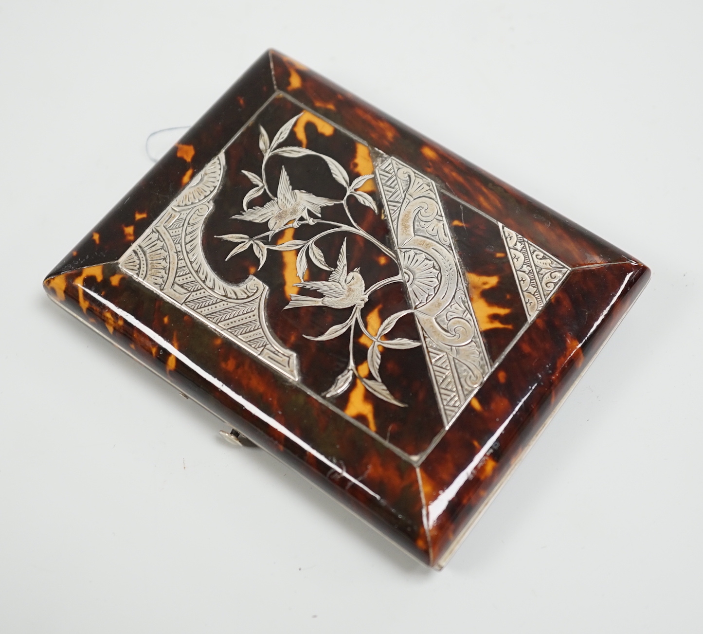 A Victorian silver inlaid tortoiseshell card case, 10.5cm wide, 8cm deep, Ivory submission reference: JHPMTXAF                                                                                                              