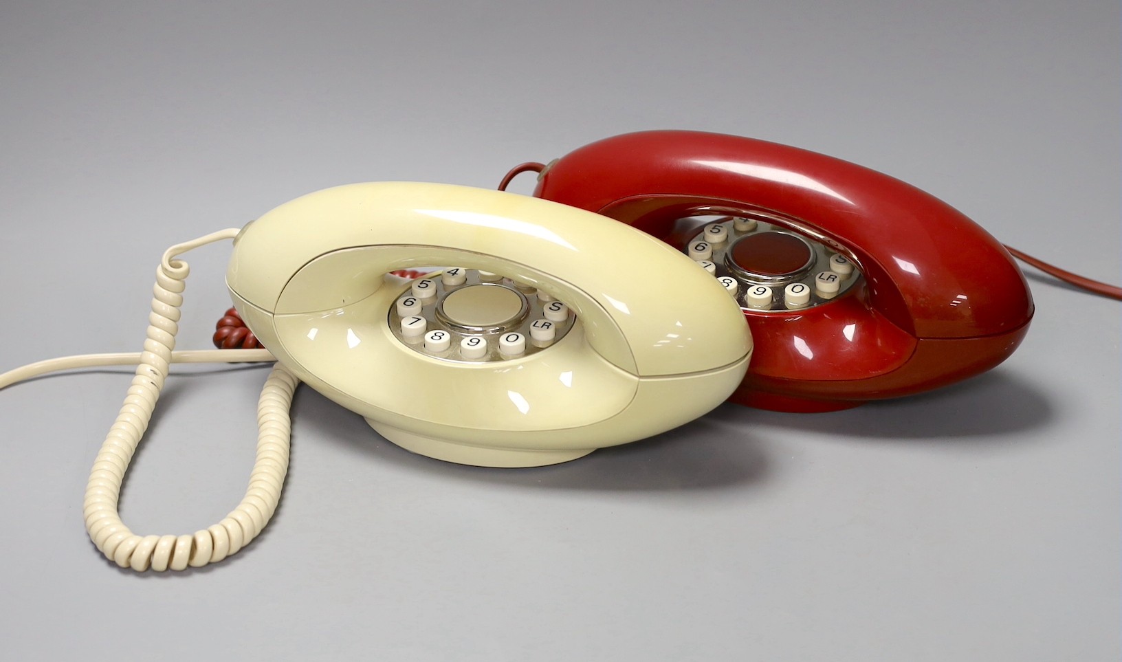 Two Autophon telephone handsets, AUG002 and AUG005, 24 cms wide                                                                                                                                                             