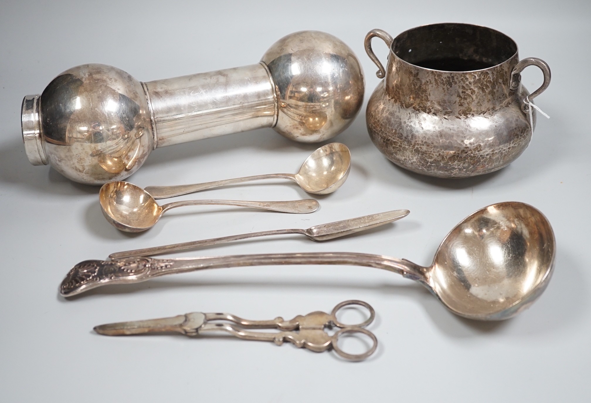 Mixed silver and plated ware including a Victorian silver Kings pattern soup ladle, London, 1857, a George III silver marrow scoop, London, 1789, a pair of later Old English pattern sauce ladles, a sterling bonbon dish, 