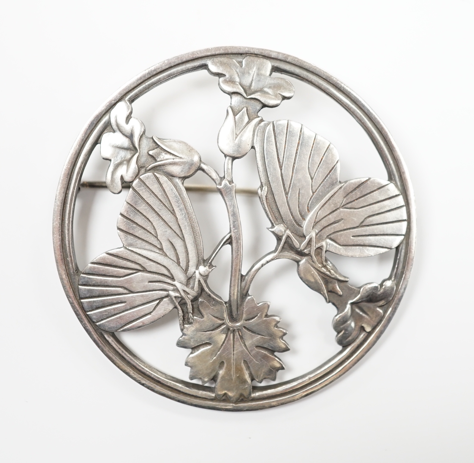A George Jensen sterling ' butterflies amid foliage' circular brooch, design no. 283, 52mm.                                                                                                                                 