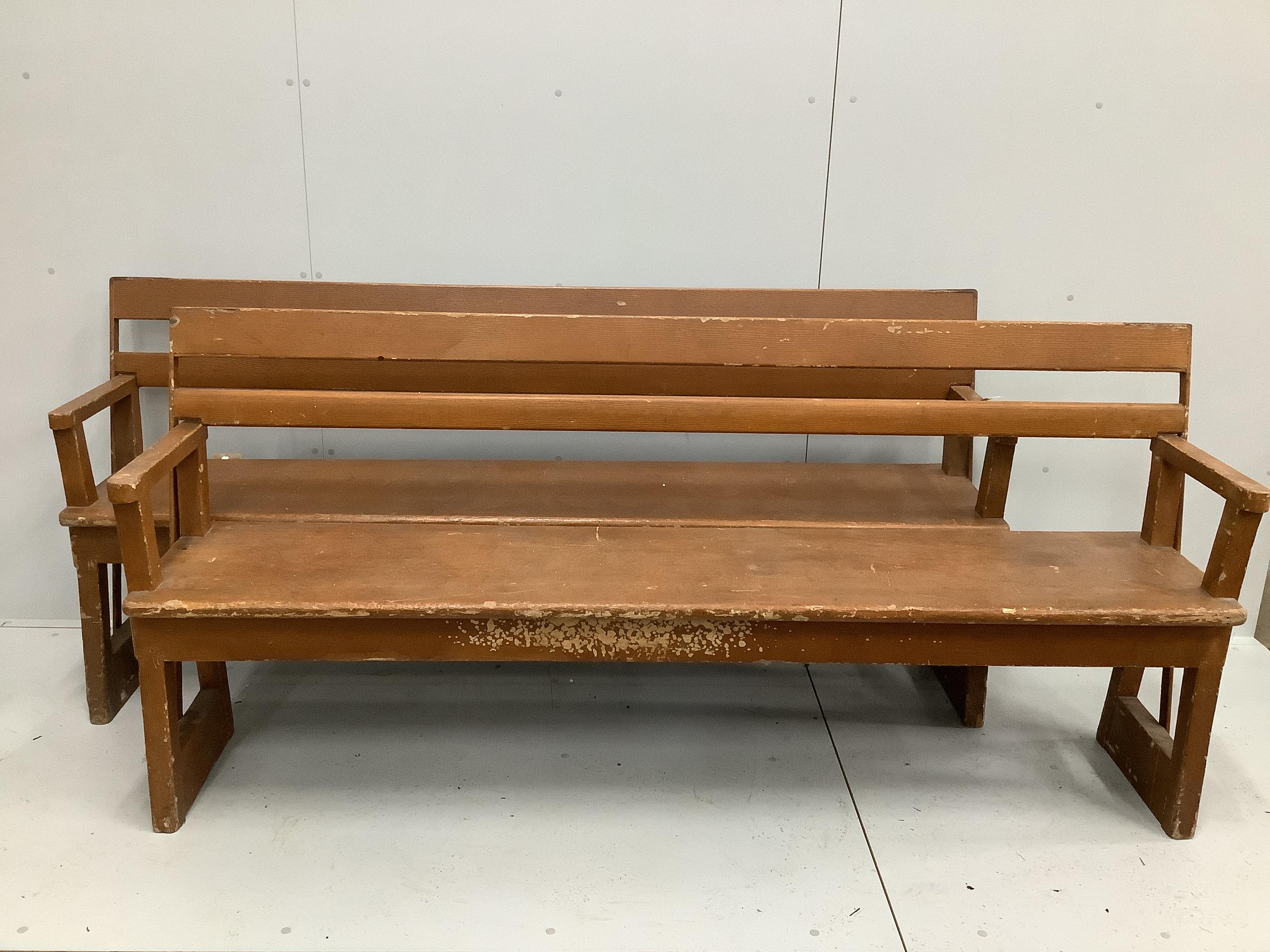 A pair of late 19th century Continental painted pine station benches with hinged adjustable backs, length 200cm, depth 41cm, height 91cm                                                                                    