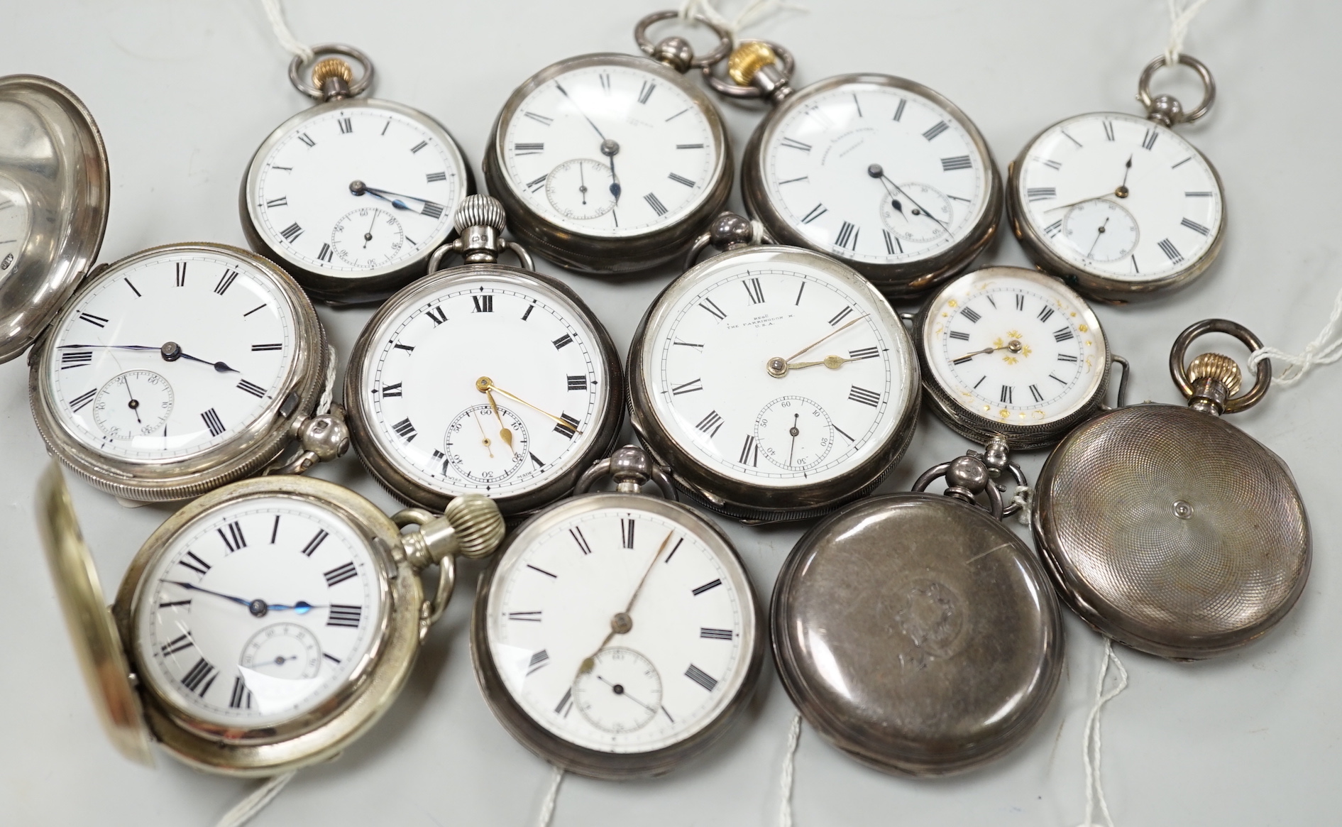 Twelve assorted mainly silver pocket watches including 'The Farringdon', Russell's and John Walker.                                                                                                                         