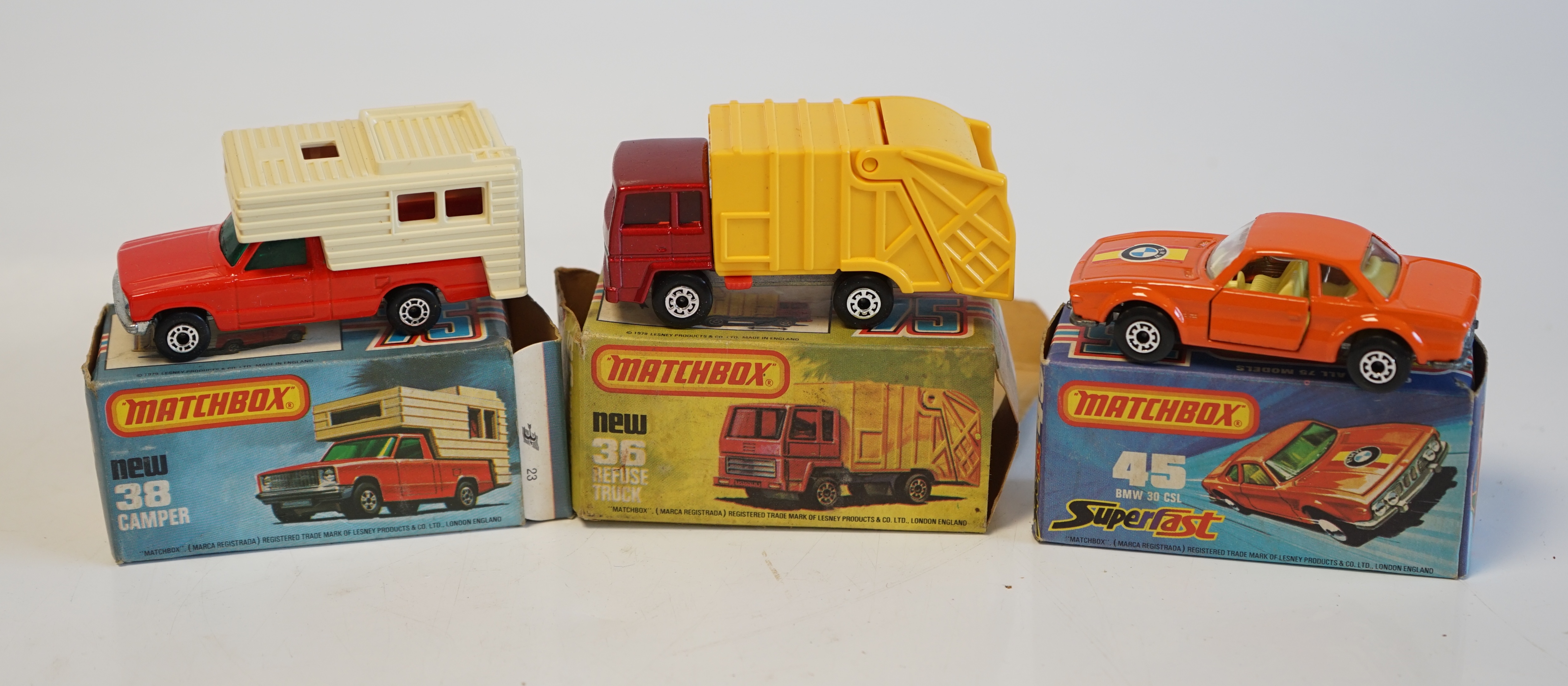 Seventeen boxed Matchbox Series 1-75 diecast vehicles including; 14; Petrol Tanker, 28; Formula Racing Car and another, 31; Caravan, 35; Zoo Truck, 36; Refuse Truck, 38; Camper, 45; BMW 30 CSL, 63; 4x4 Open Back Truck, 6