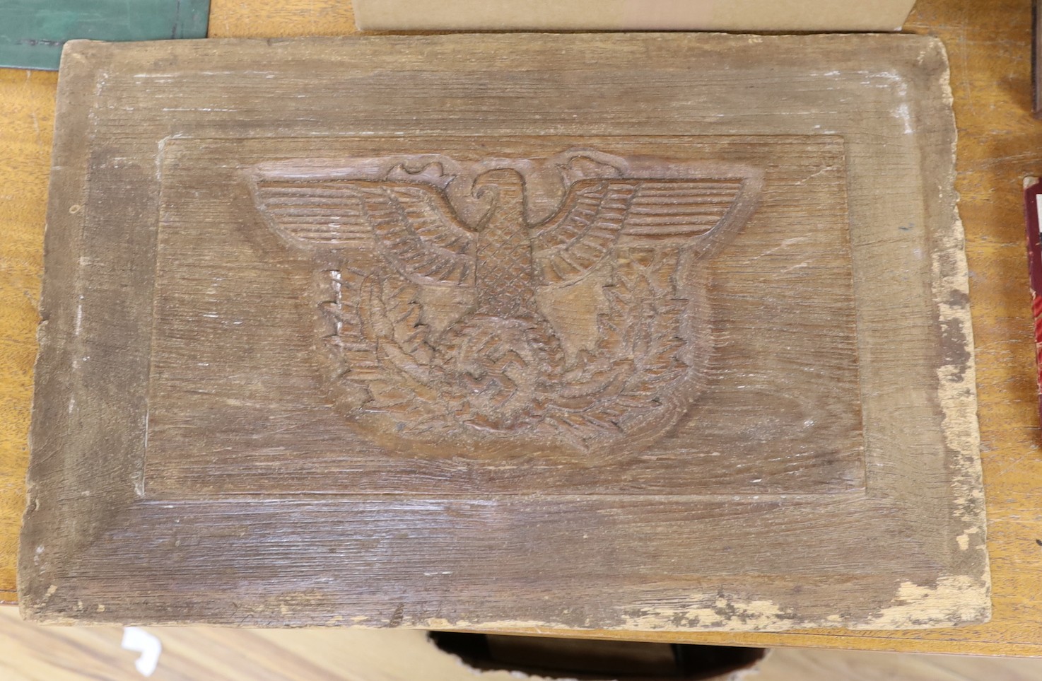 A 1930’s Third Reich carved oak fielded panel, 50cm wide                                                                                                                                                                    