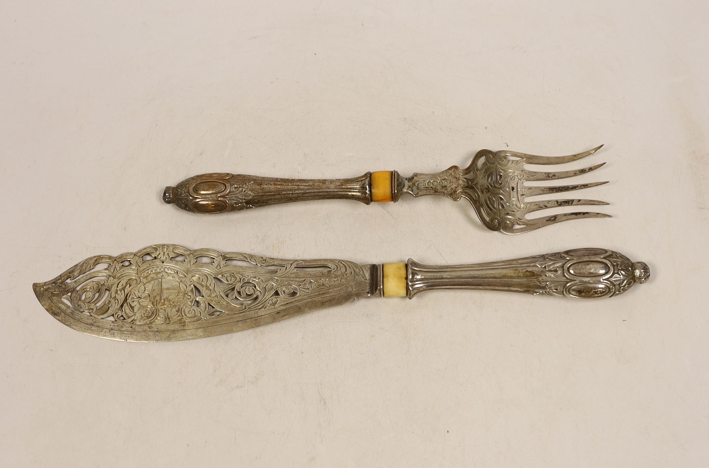 A pair of Victorian silver fish servers engraved and pierced decoration and silver handles (filled), Atkin Brothers, Sheffield 1863, knife 34.4cm. CITES Submission reference Z5185TNK                                      