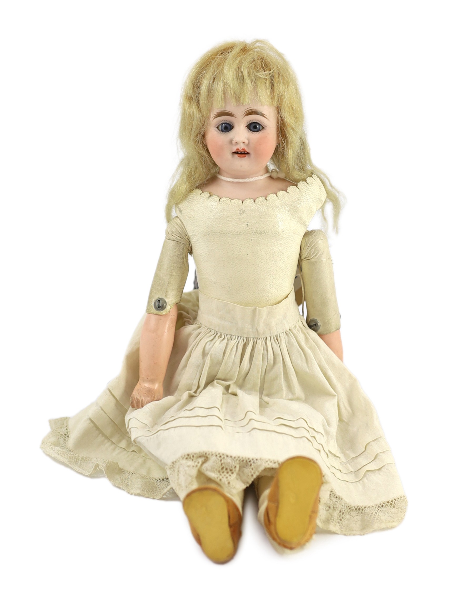 An Armand Marseille shoulder-bisque doll, German, circa 1896, 14in.                                                                                                                                                         