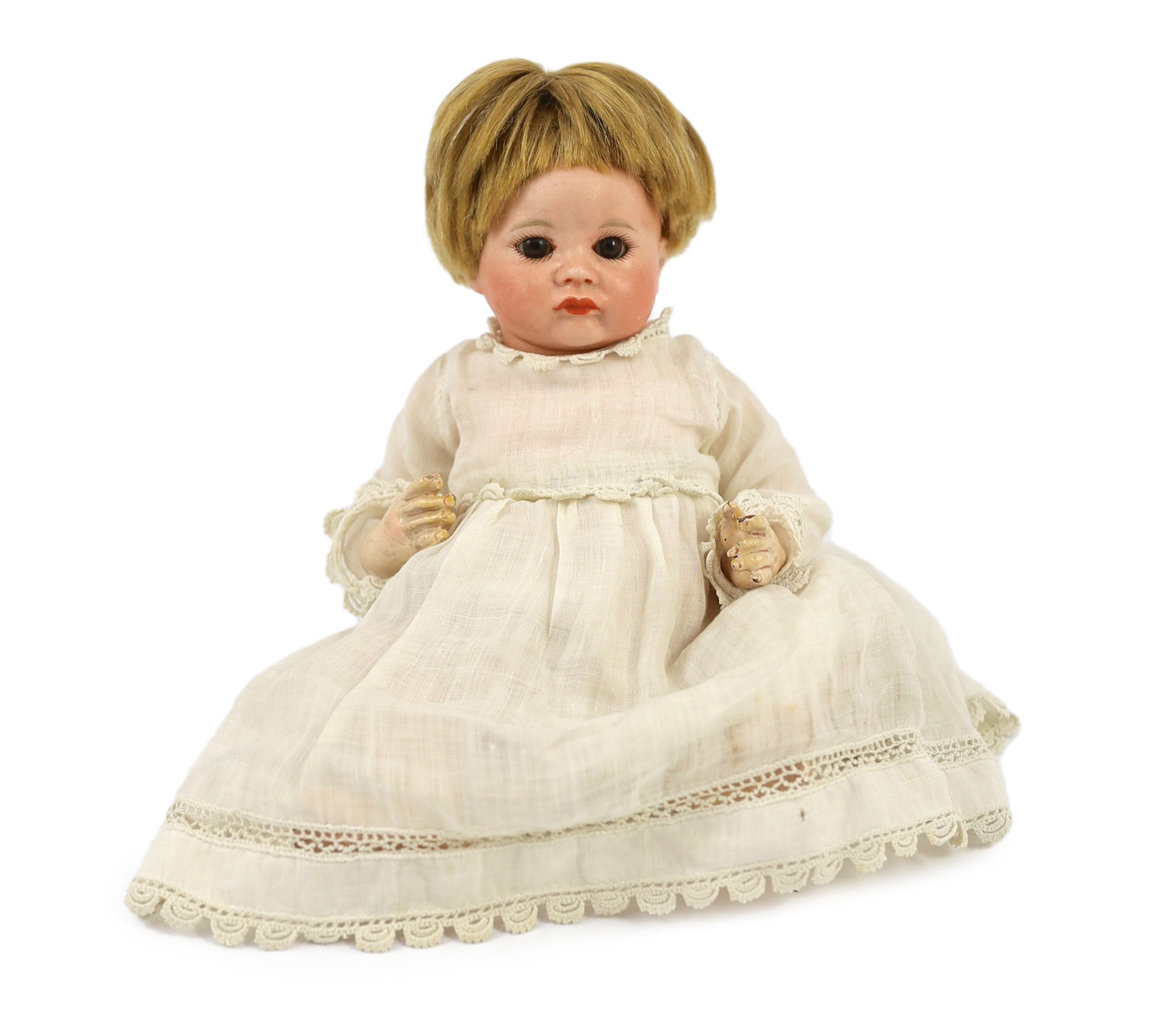 An SFBJ bisque character doll, French, circa 1925, 9in.                                                                                                                                                                     