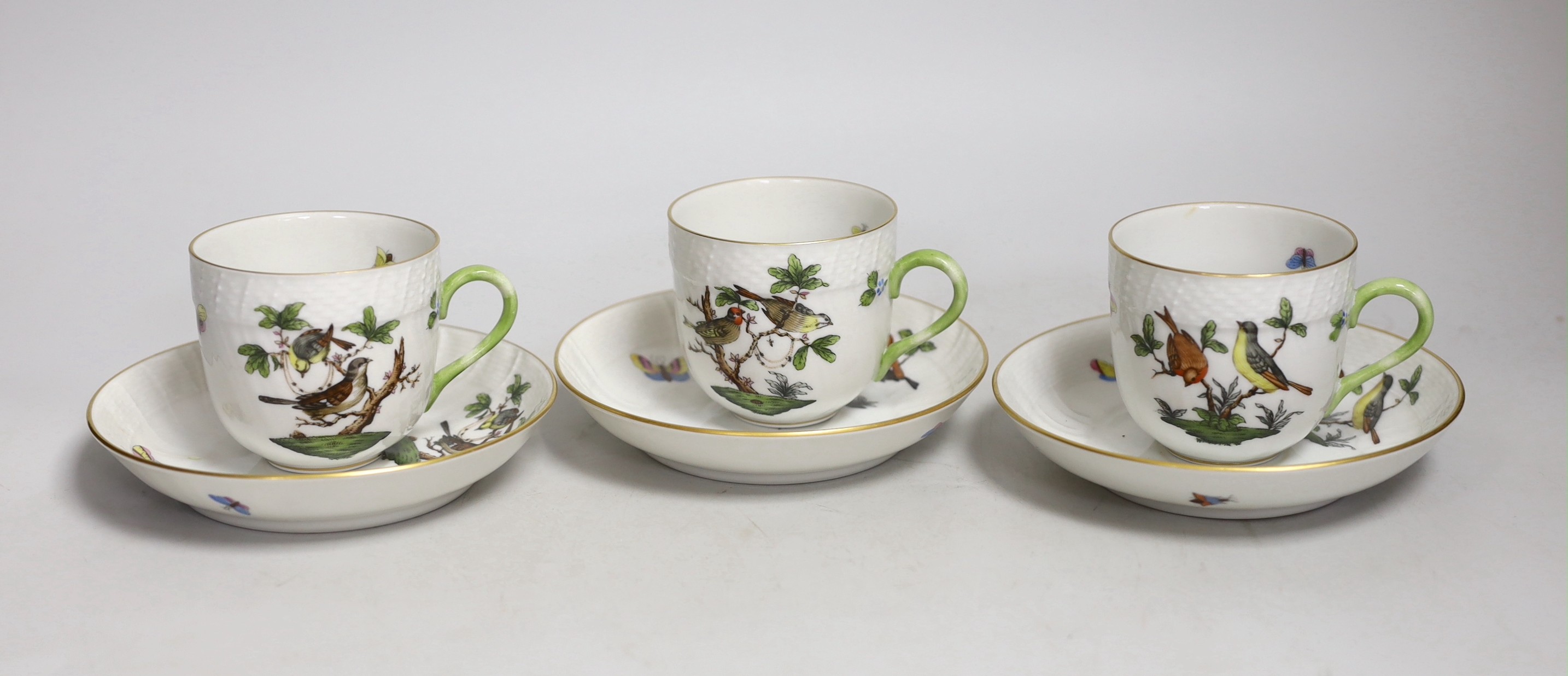 Three matching Herend teacups and saucers (one a.f.), pattern no.1707.                                                                                                                                                      