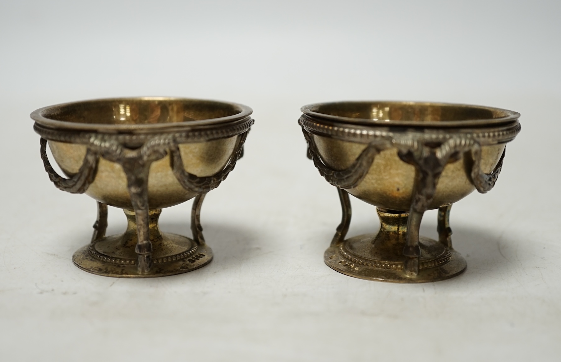 A pair of Victorian silver circular salts?, Martin, Hall & Co, London?, 1867, with removeable dishes and helix stems (part of a cruet stand?), diameter 56mm. Condition - poor. Solder repairs.                             