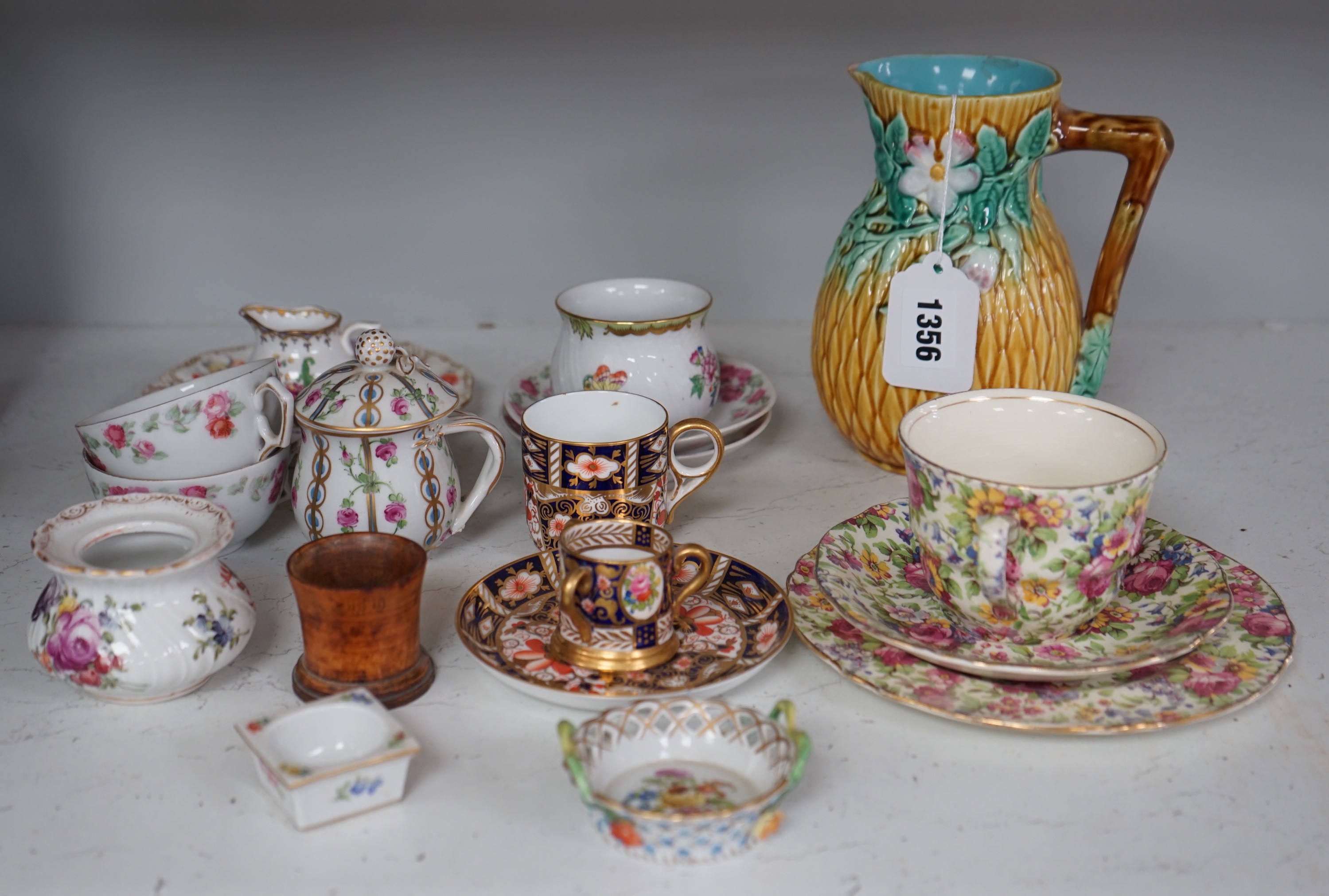 A group of continental porcelain, to include Meissen, Dresden etc. cups, trinkets, jugs, and saucers, tallest 16.5cm                                                                                                        