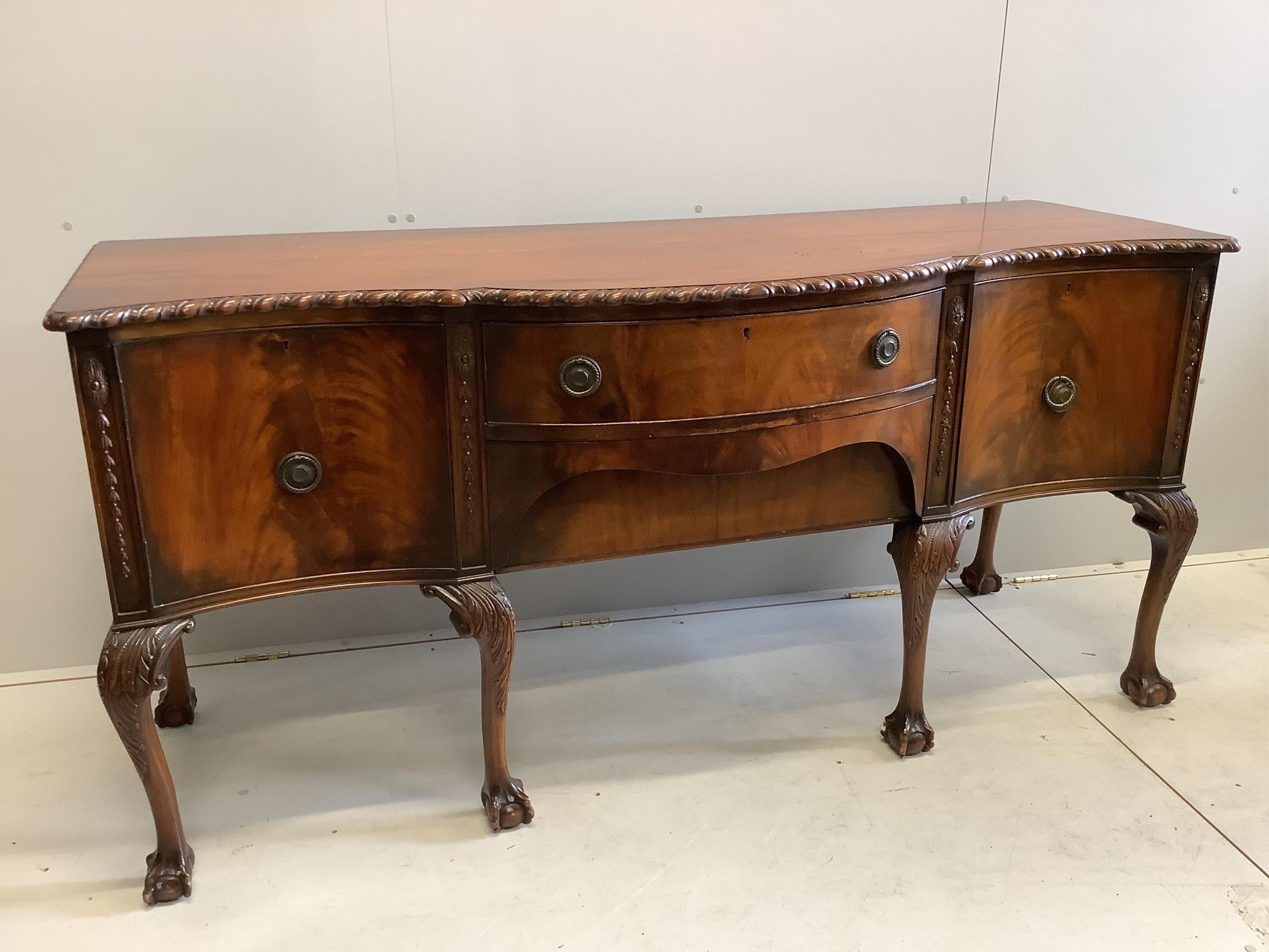 A Chippendale Revival mahogany serpentine sideboard, width 182cm, depth 66cm, height 90cm                                                                                                                                   