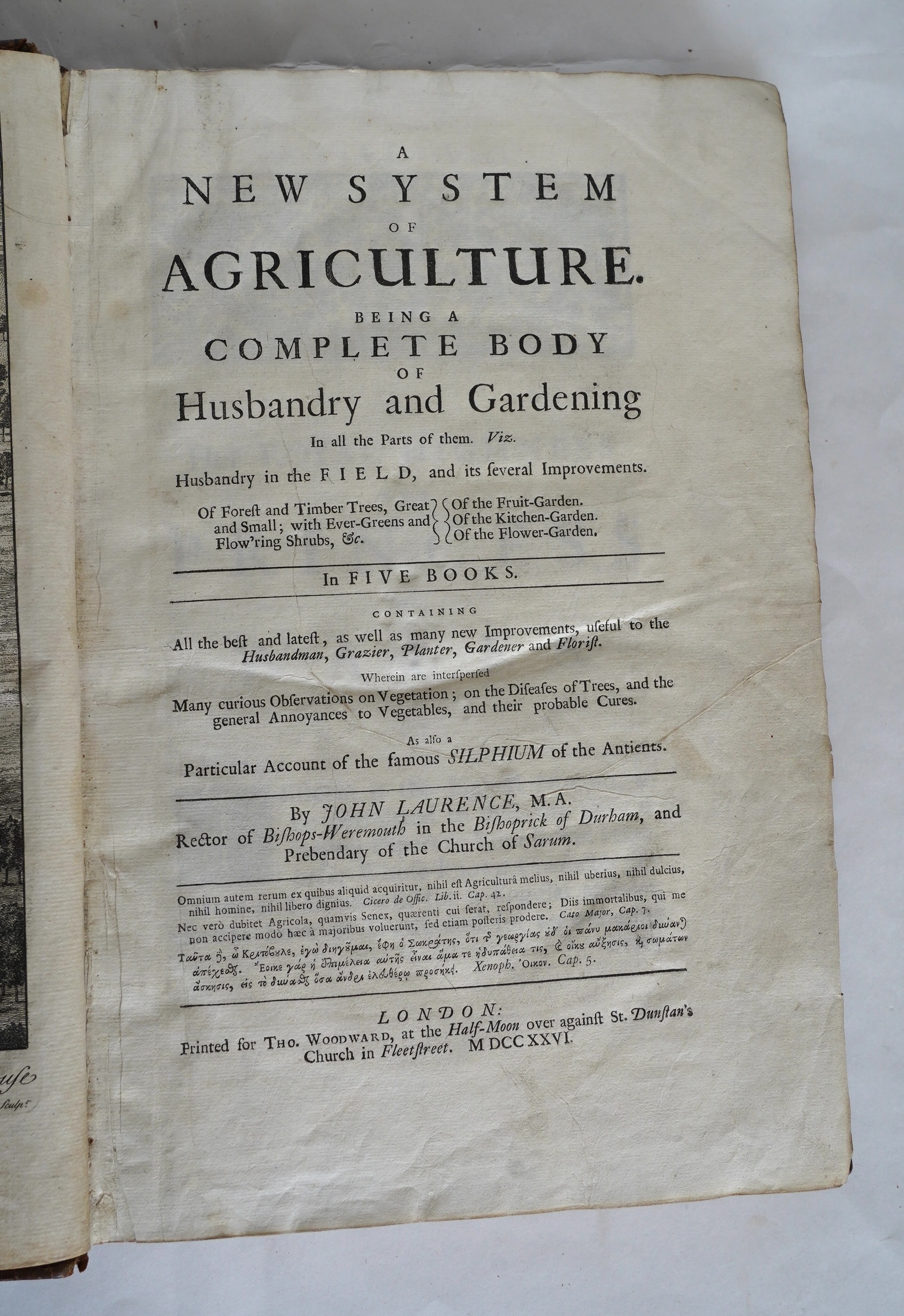 Laurence, John - A New System of Agriculture. Being a complete body of husbandry and gardening....1st edition. frontis. 2 plates, engraved text illus., head and tailpiece decorations; contemp. blind decorated panelled ca