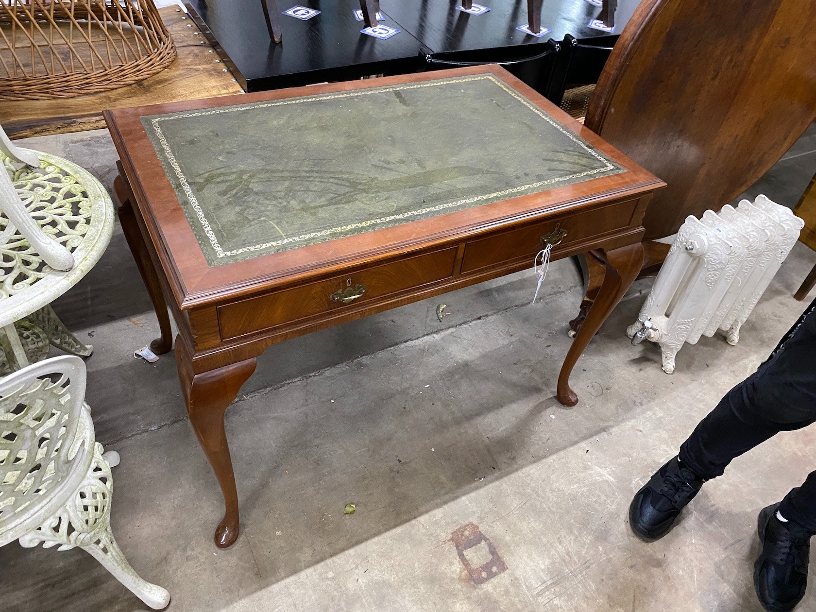 A reproduction Victorian style two drawer writing table, width 110cm, depth 70cm, height 77cm                                                                                                                               