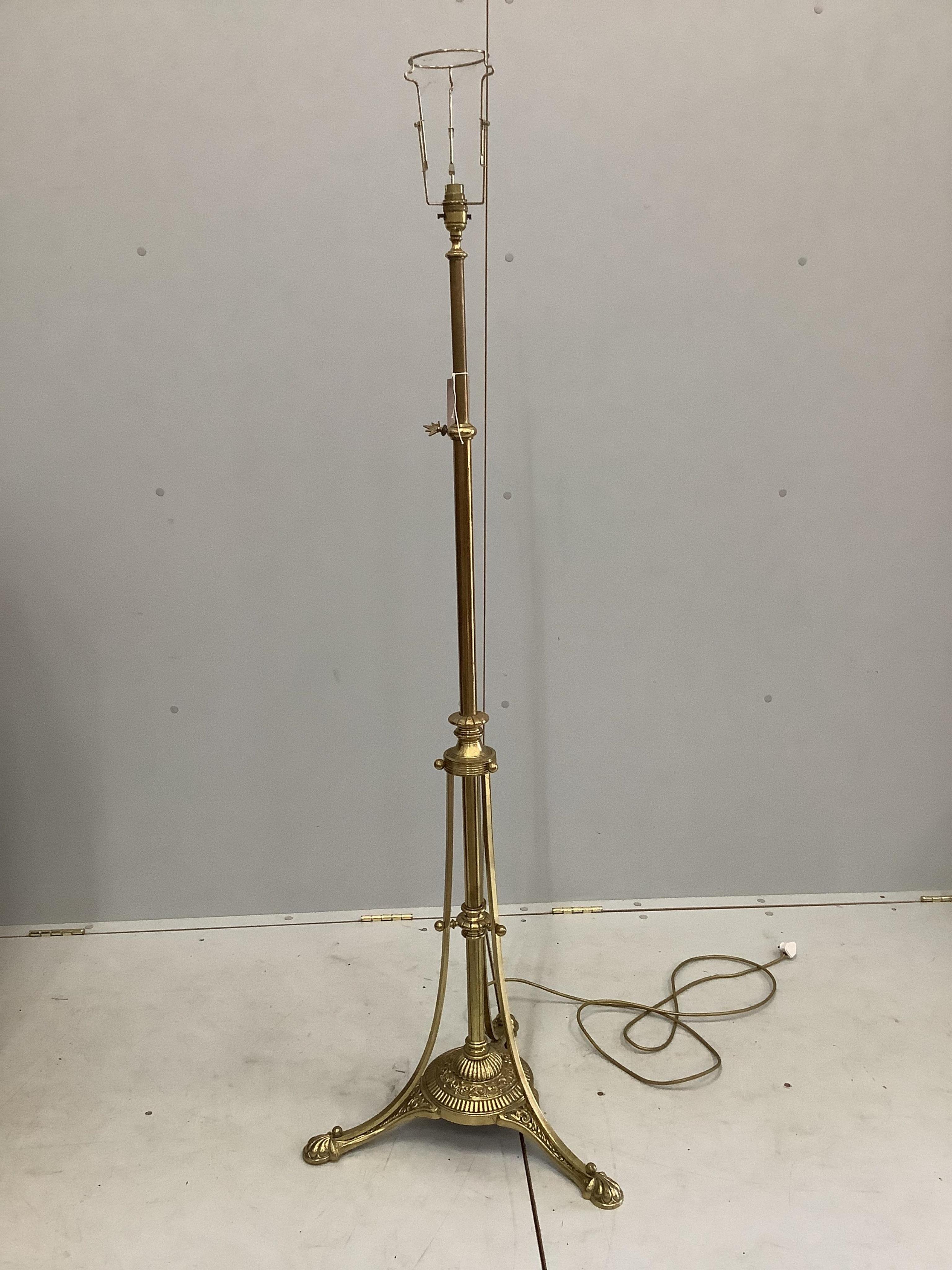 A late Victorian brass telescopic standard lamp                                                                                                                                                                             