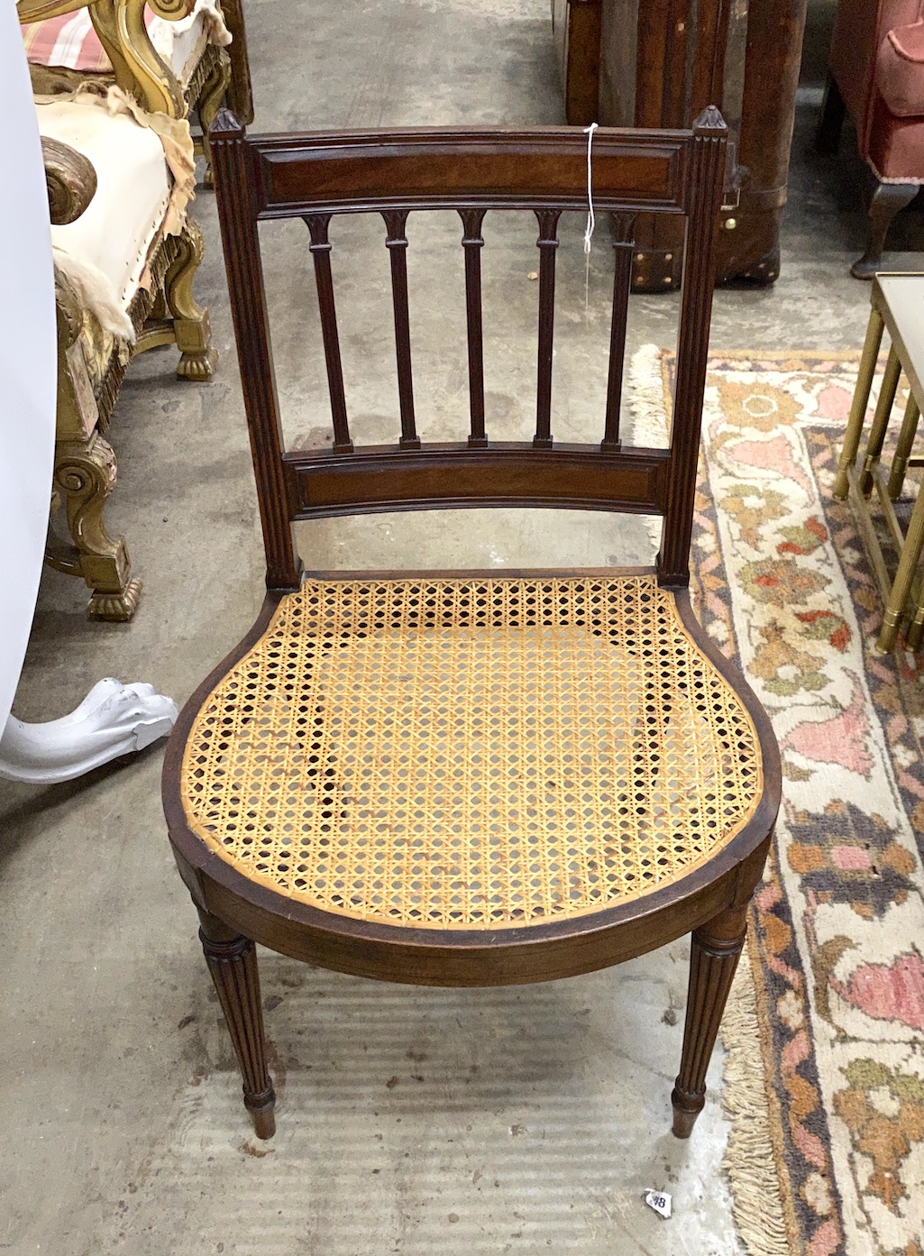 A George III in the manner of Gillows style mahogany cane seat side chair                                                                                                                                                   