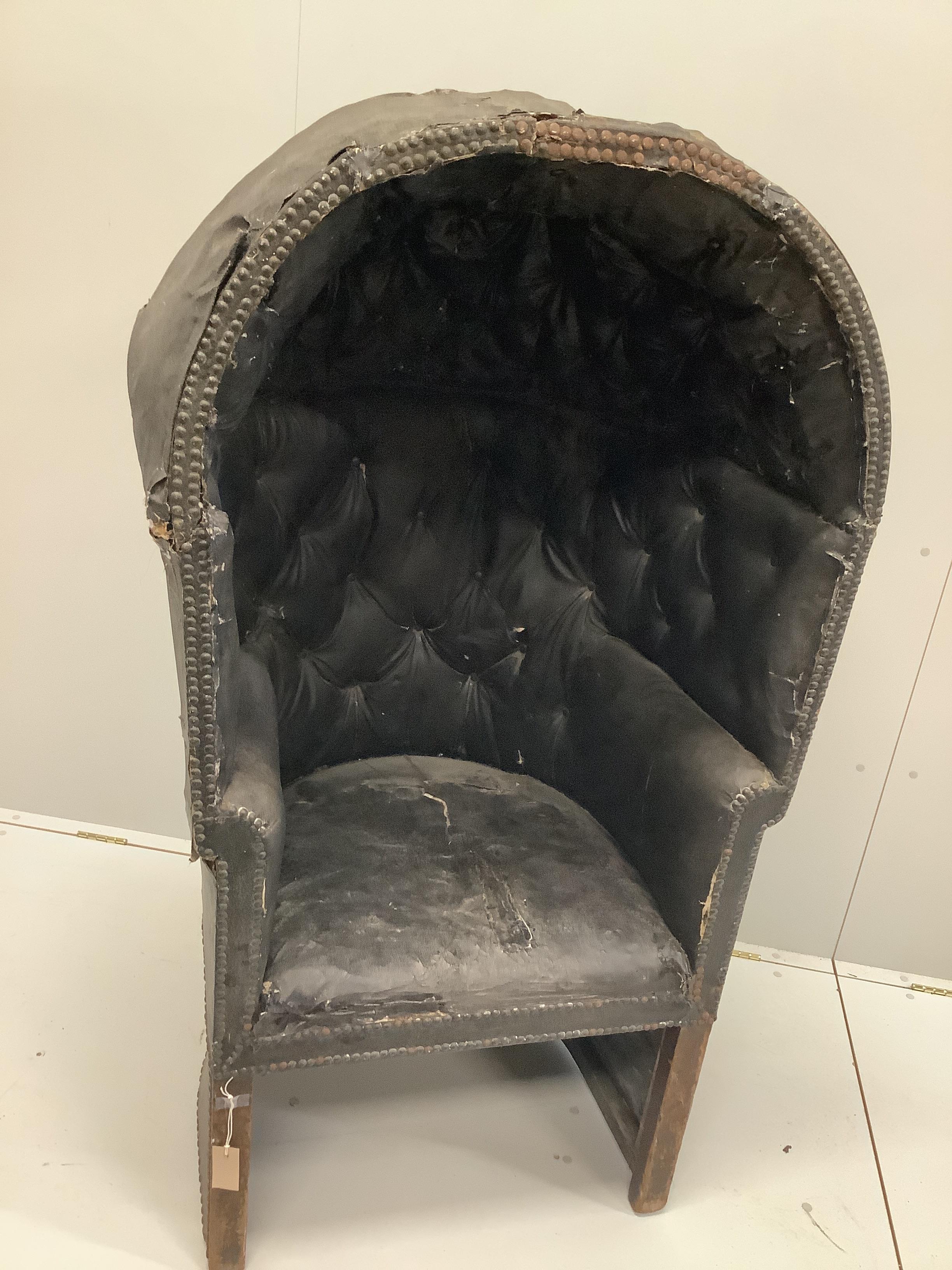 A George III porter's chair, width 82cm, depth 70cm, height 150cm                                                                                                                                                           