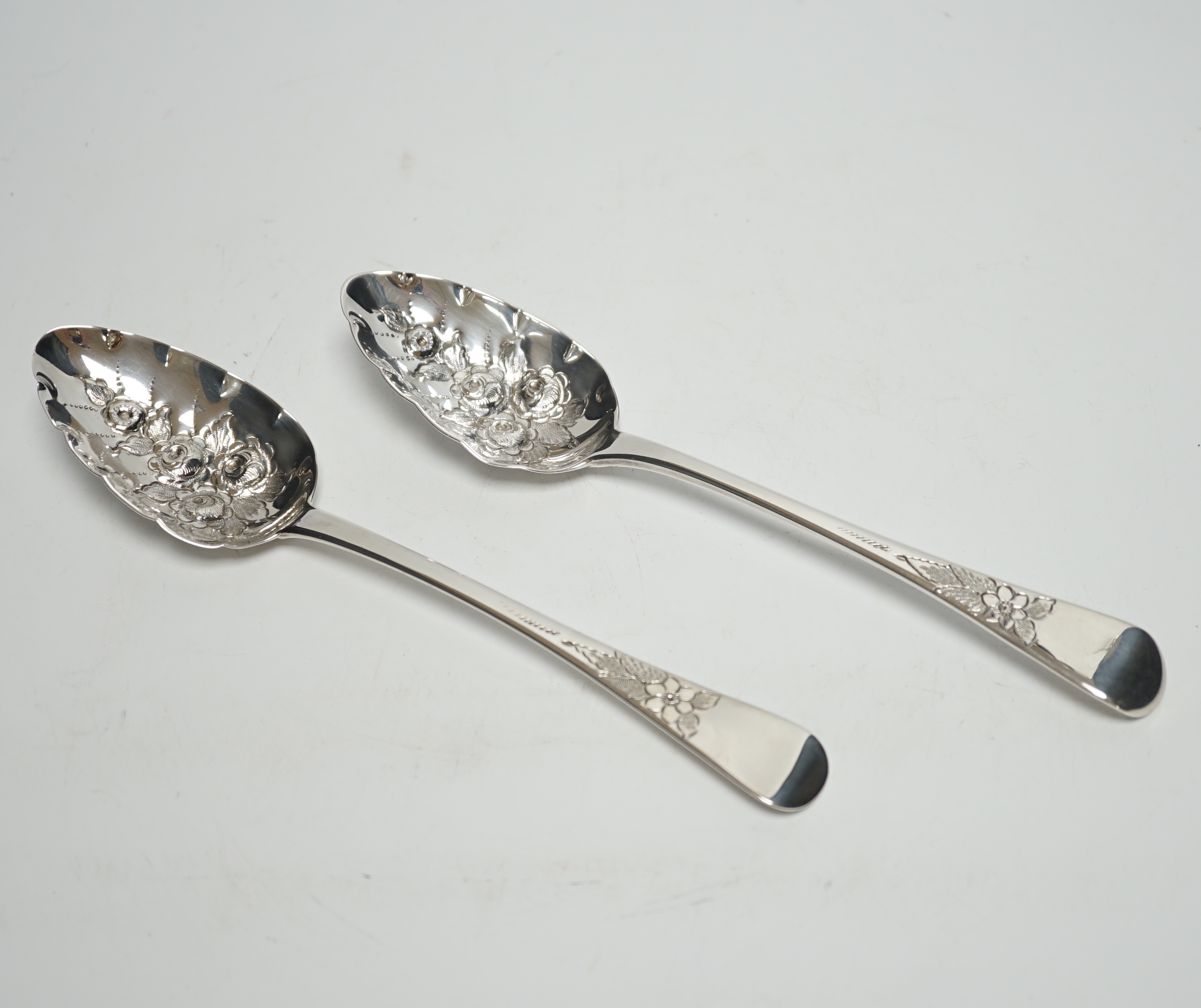A pair of George III Old English pattern 'berry' spoons, Thomas Wilkes Barker, London, 1812, 22.3cm                                                                                                                         