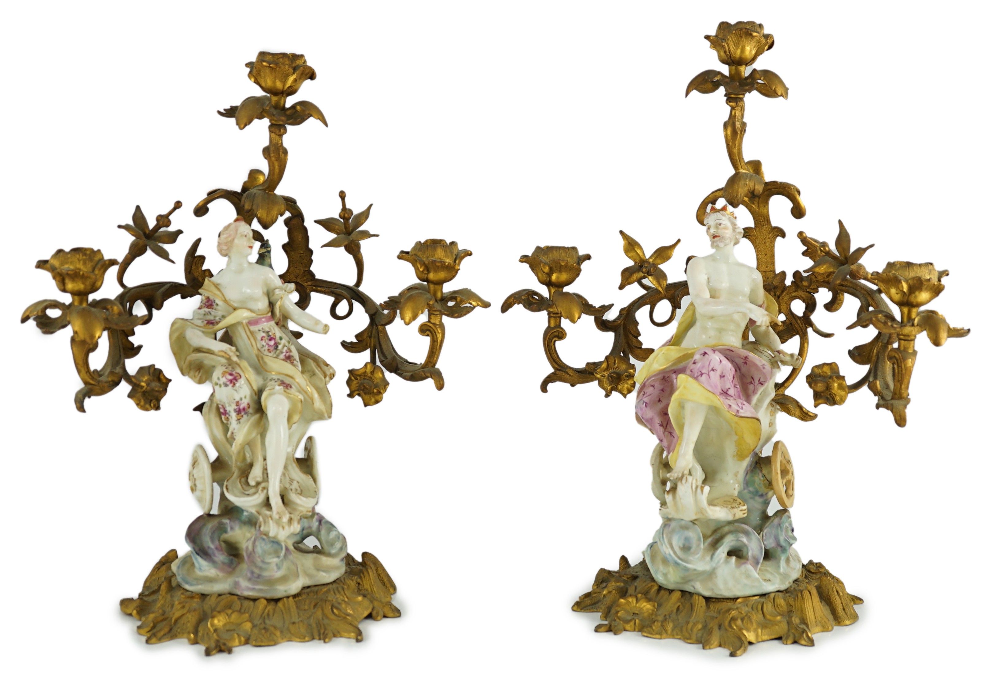 A pair of large Derby porcelain and ormolu mounted ‘Juno and Jupiter’ figural candelabra, the figures c.1760, total height 39 and 41cm, losses and restoration, Provenance - purchased from Winifred Williams, Eastbourne/Lo