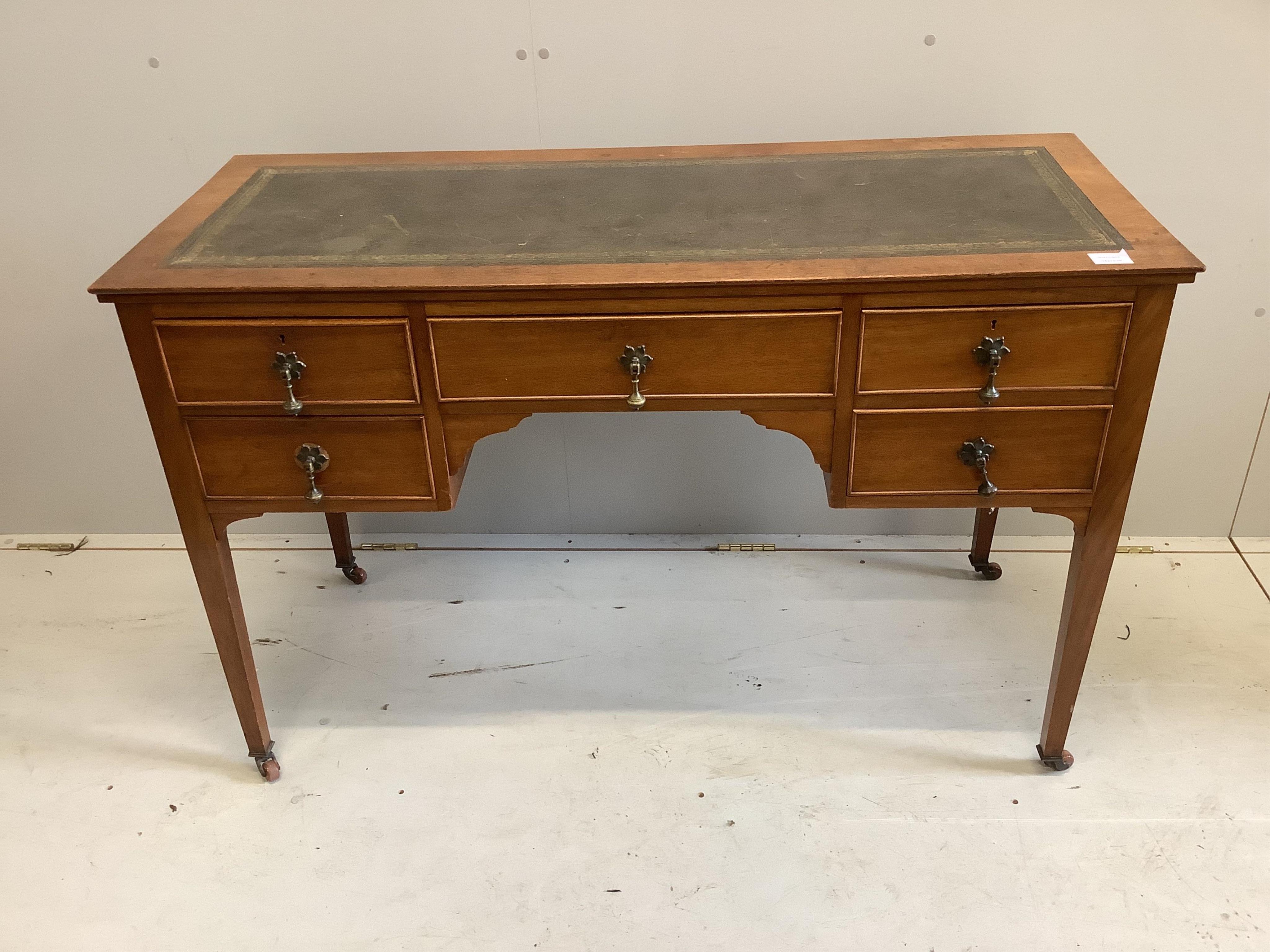 An early 20th century mahogany kneehole writing table, width 122cm, depth 50cm, height 78cm. Condition - fair                                                                                                               