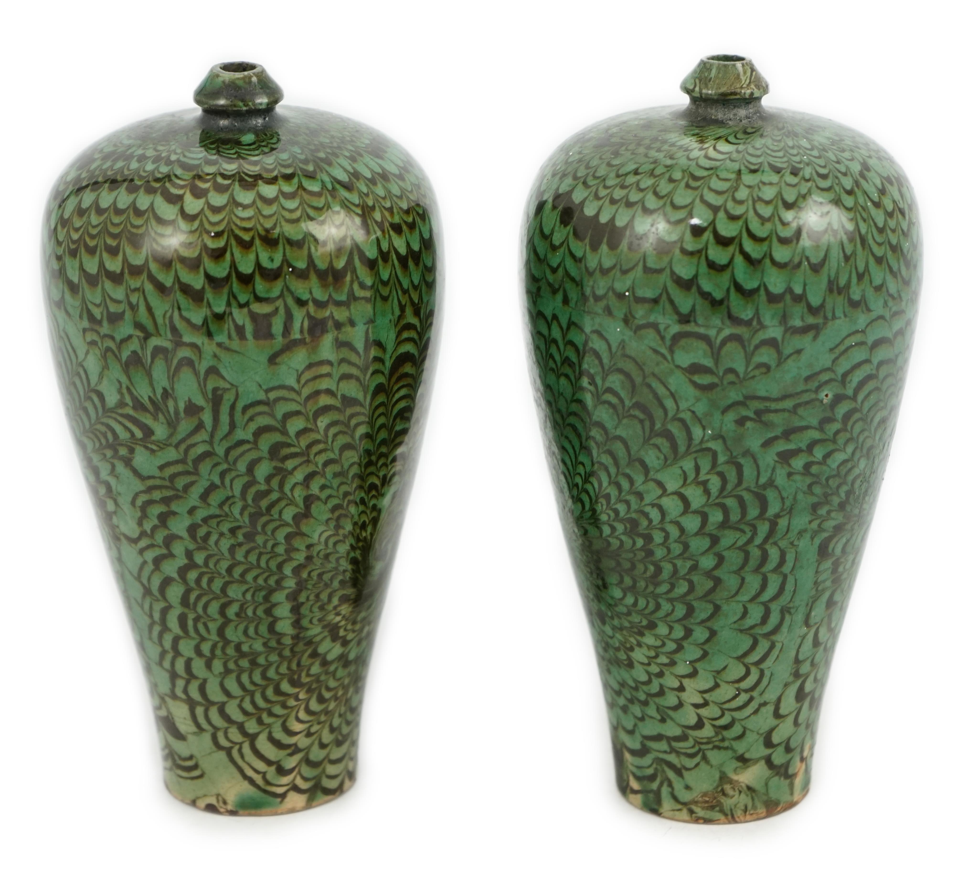 A pair of Chinese Cizhou green glazed meiping, probably Ming dynasty                                                                                                                                                        