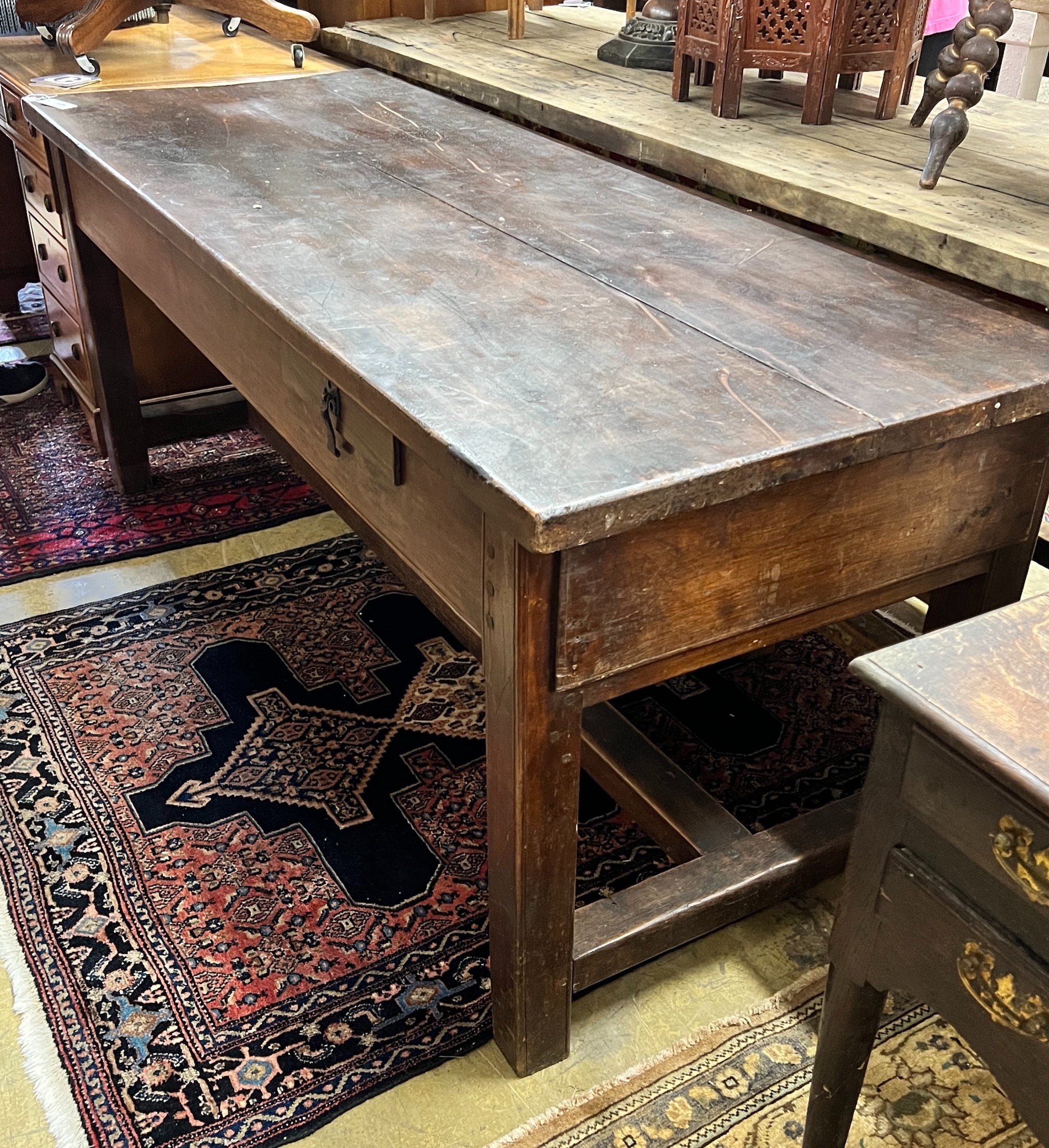 A 19th century French plank top rectangular extending kitchen table, length 190cm, width 72cm, height 78cm                                                                                                                  
