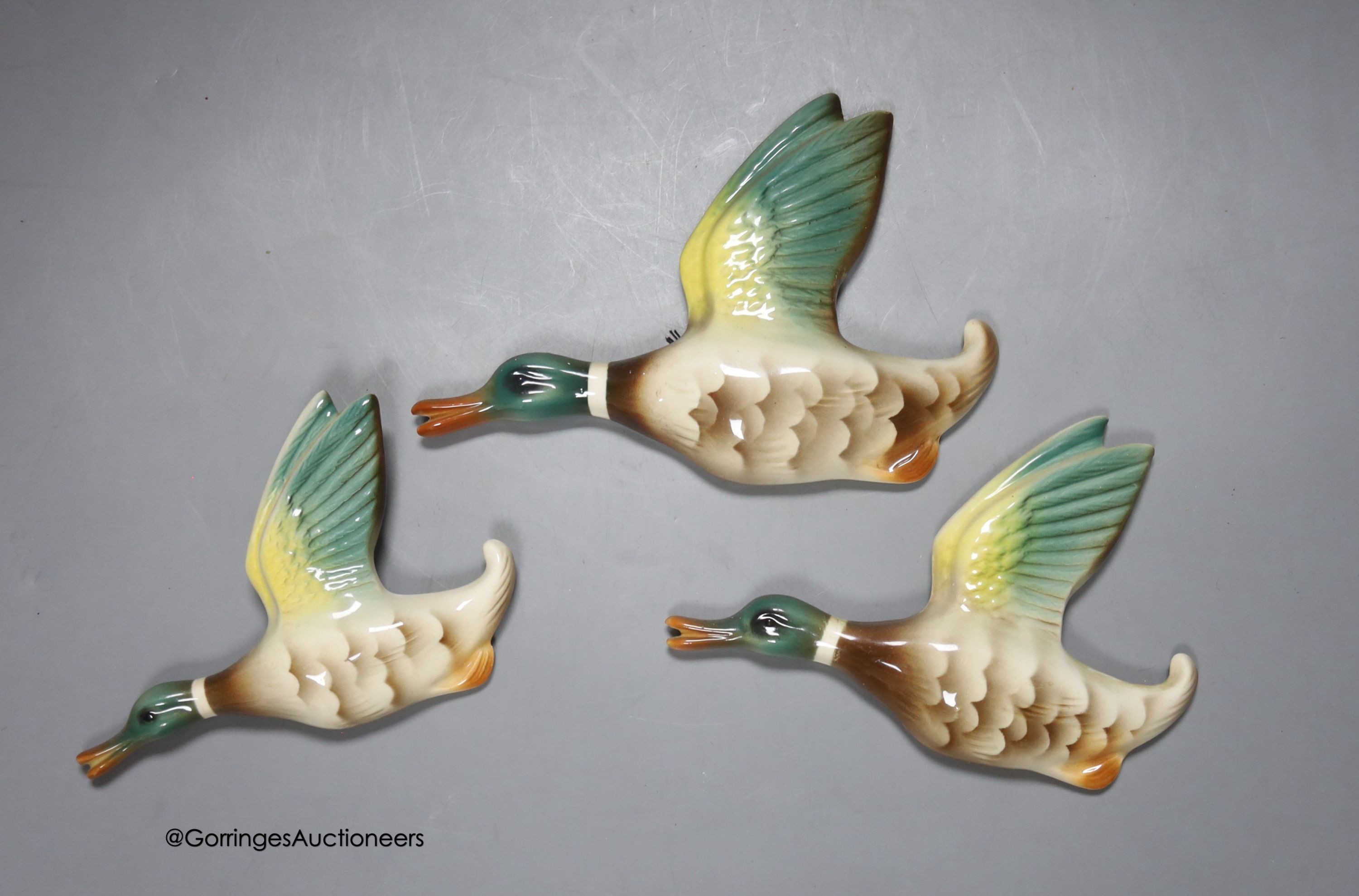 Three graduated pottery flying ducks, by Keele Street Potteries                                                                                                                                                             