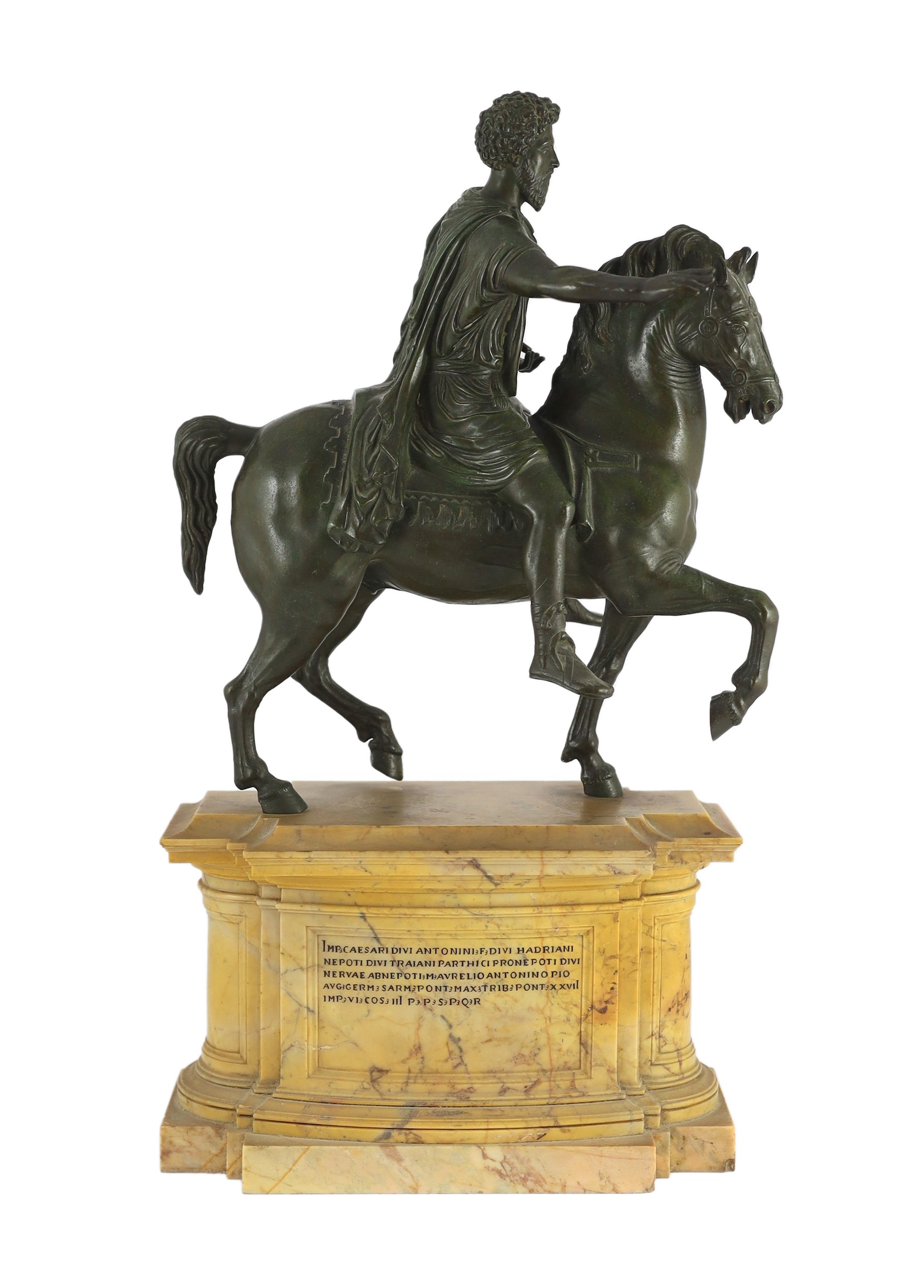 After the Antique. A 19th century Italian Grand Tour bronze equestrian group, modelled as Emperor Marcus Aurelius on horseback, 31cm wide, 16cm deep, overall 57cm high                                                     