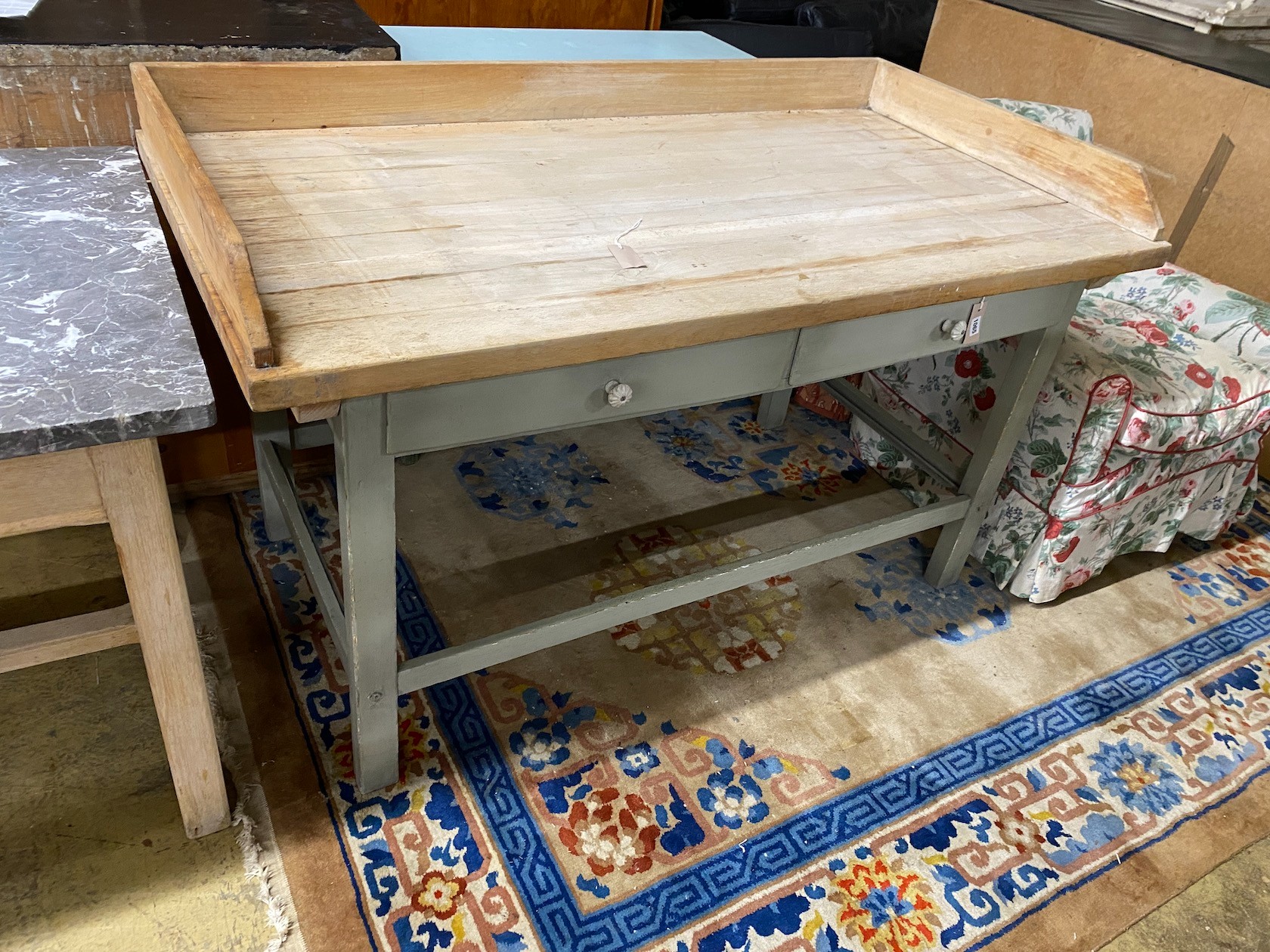 A late 19th / early 20th century part painted pine kitchen table with galleried top, length 150cm, depth 80cm, height 91cm                                                                                                  