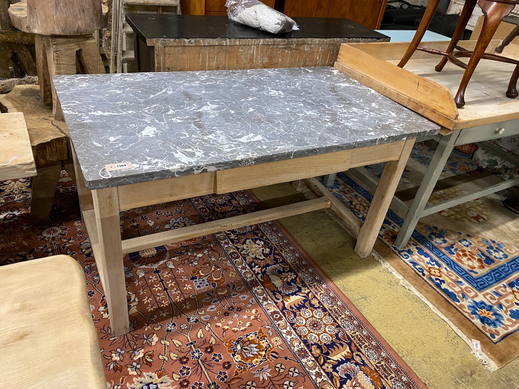 An early 20th century Continental bleached oak kitchen table with rectangular marble top, width 140cm, depth 80cm, height 77cm                                                                                              