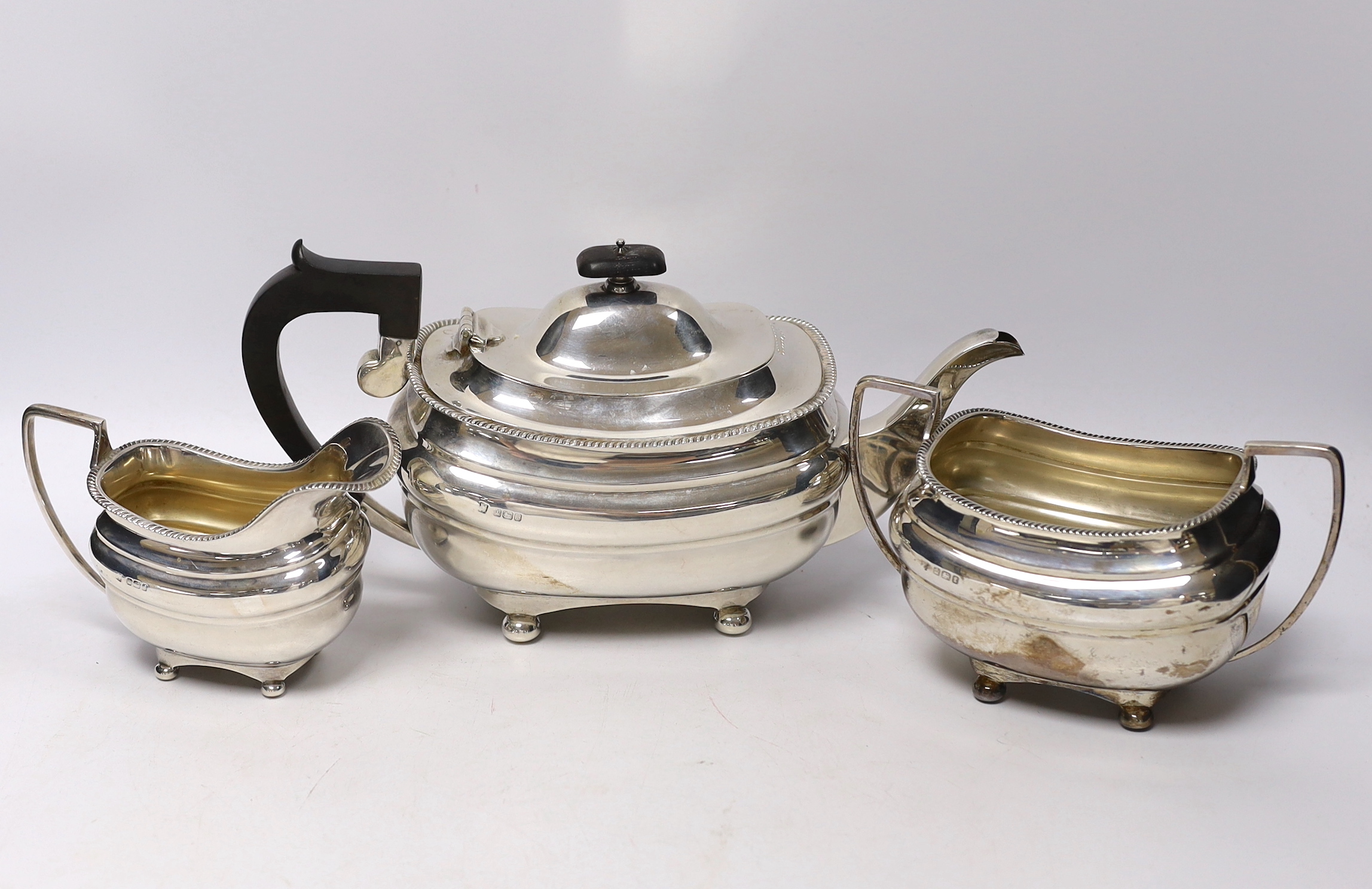 A George V silver three piece tea set, Fordham & Faulkner, Sheffield, 1911                                                                                                                                                  