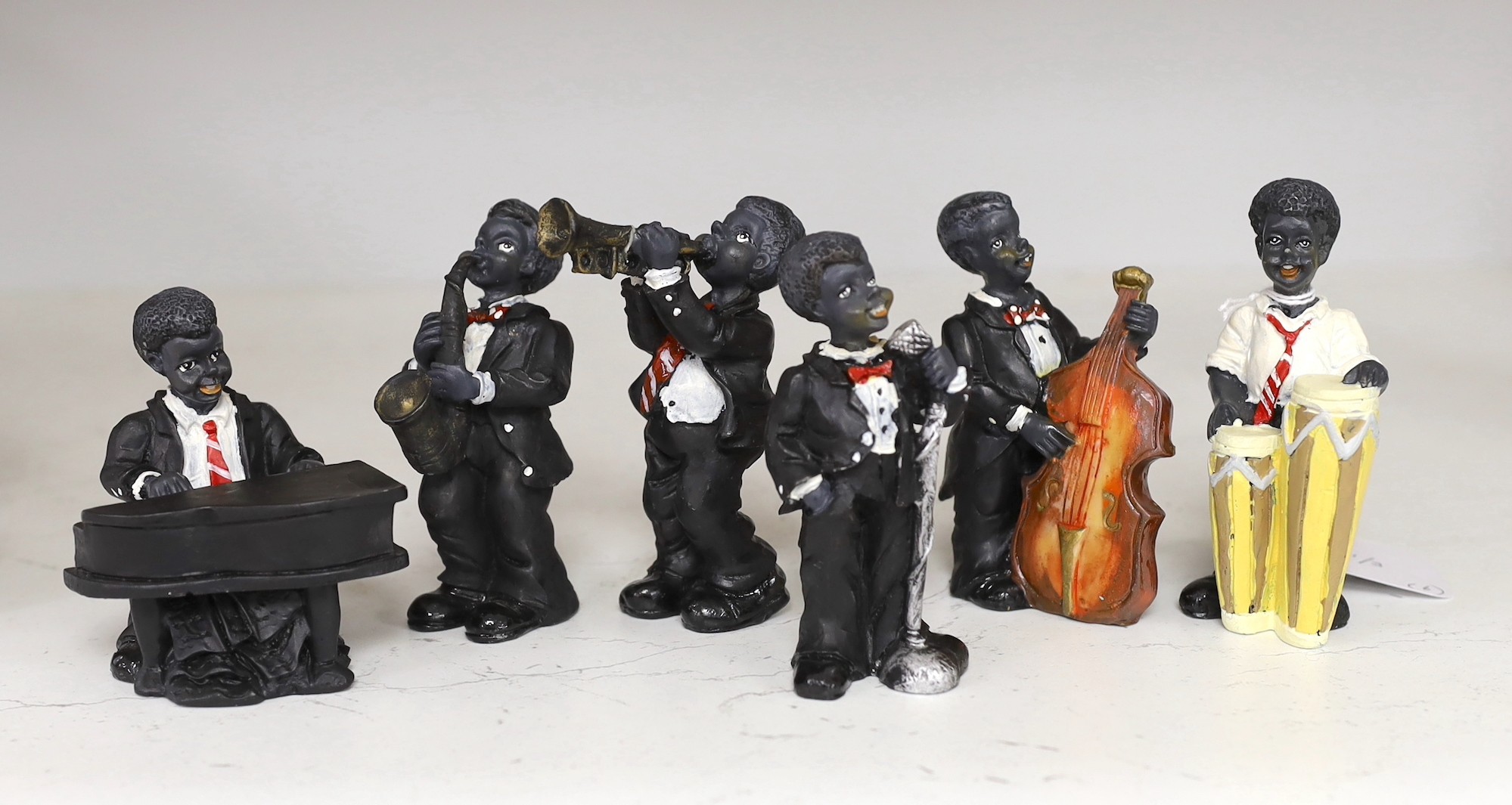 A moulded composition six-piece jazz band, 10cm tall                                                                                                                                                                        