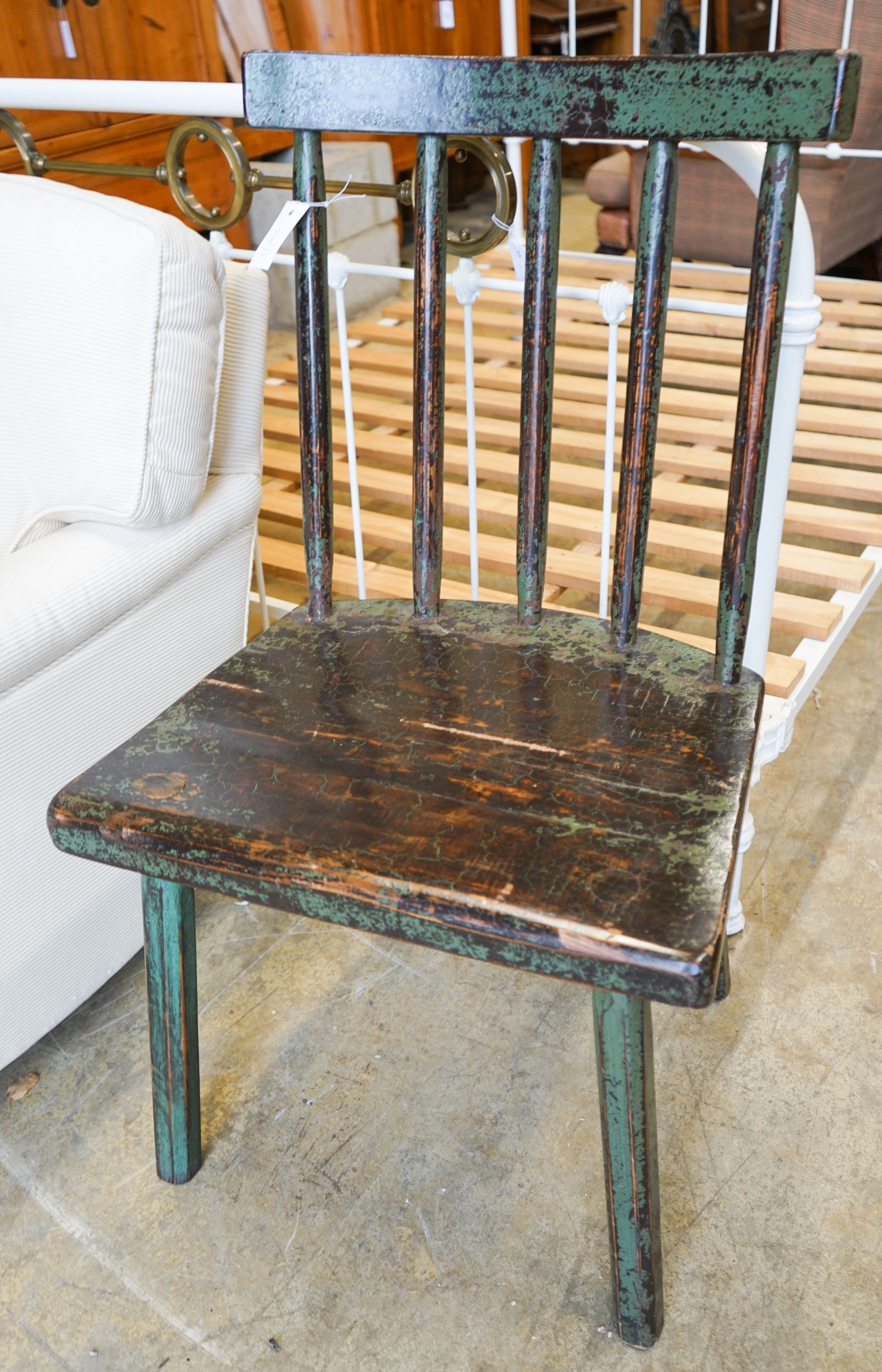 A painted primitive style comb back side chair, width 55cm, depth 45cm, height 94cm                                                                                                                                         