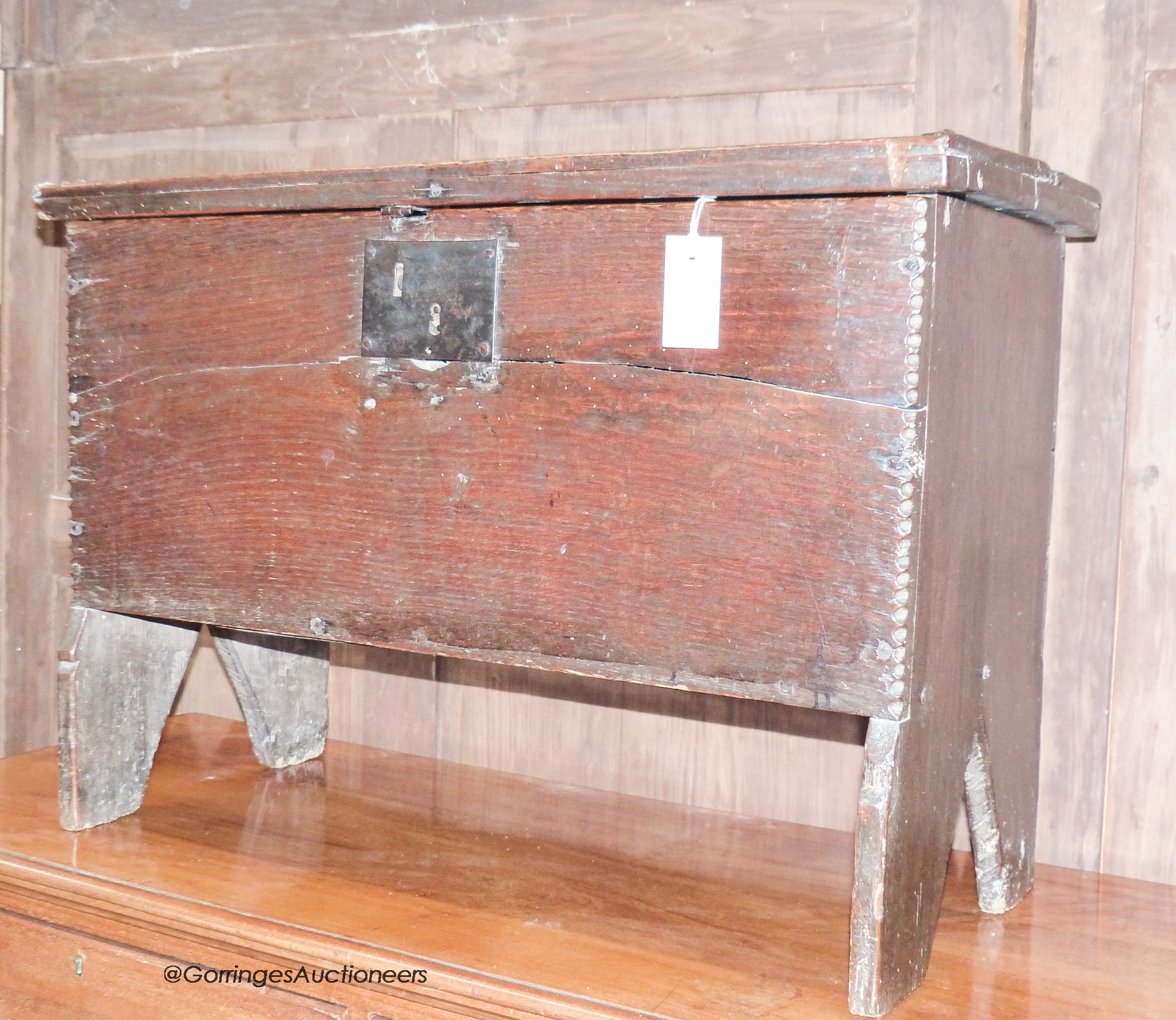 A 17th century oak six-plank coffer of small proportions                                                                                                                                                                    
