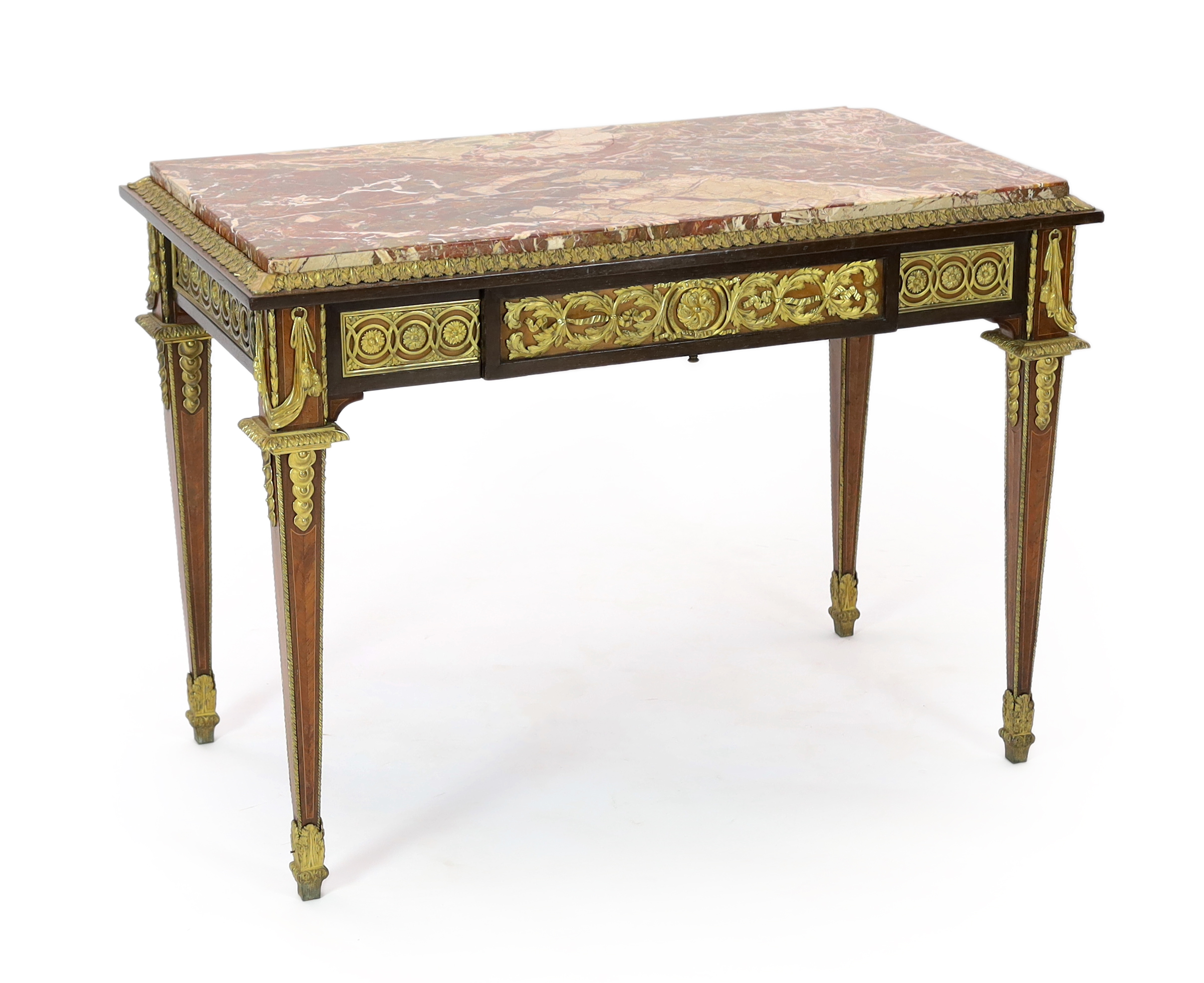 A late 19th century Louis XVI style ormolu mounted mahogany, bois satine and sycamore centre table, 113cm wide, 62cm deep, 82cm high, Please note this lot attracts an additional import tax of 5% on the hammer price      