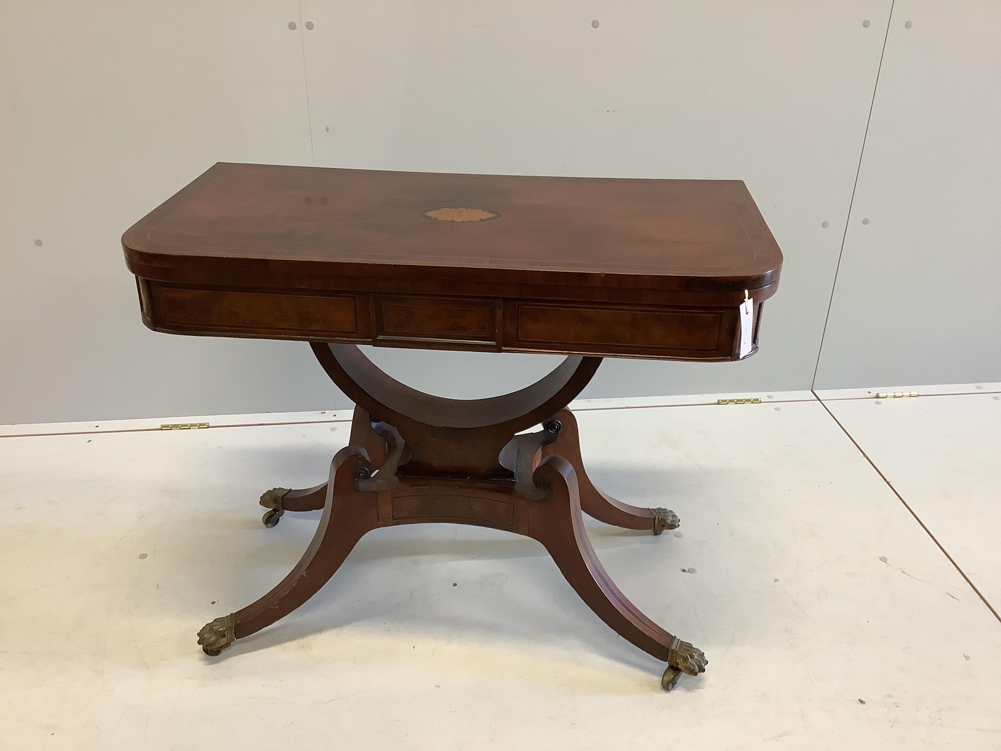 A Regency inlaid rosewood banded mahogany folding card table, width 89cm, depth 44cm, height 73cm                                                                                                                           