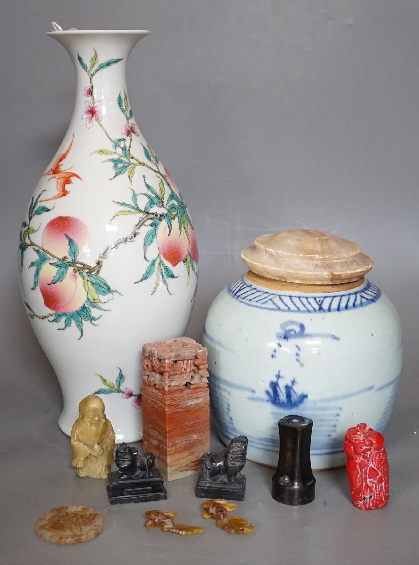 A Chinese peach vase a jar and hardstone cover and various hard stone seals etc (11 items) tallest 35cms high                                                                                                               