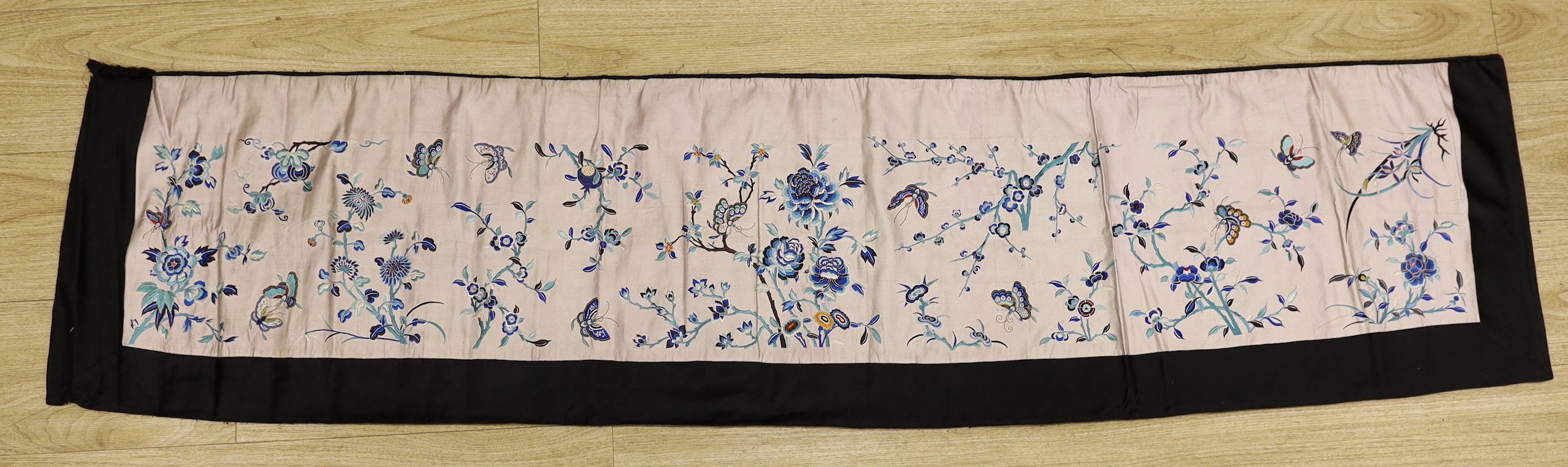 A Chinese polychrome silk embroidered panel, possibly part of a Chinese robe                                                                                                                                                
