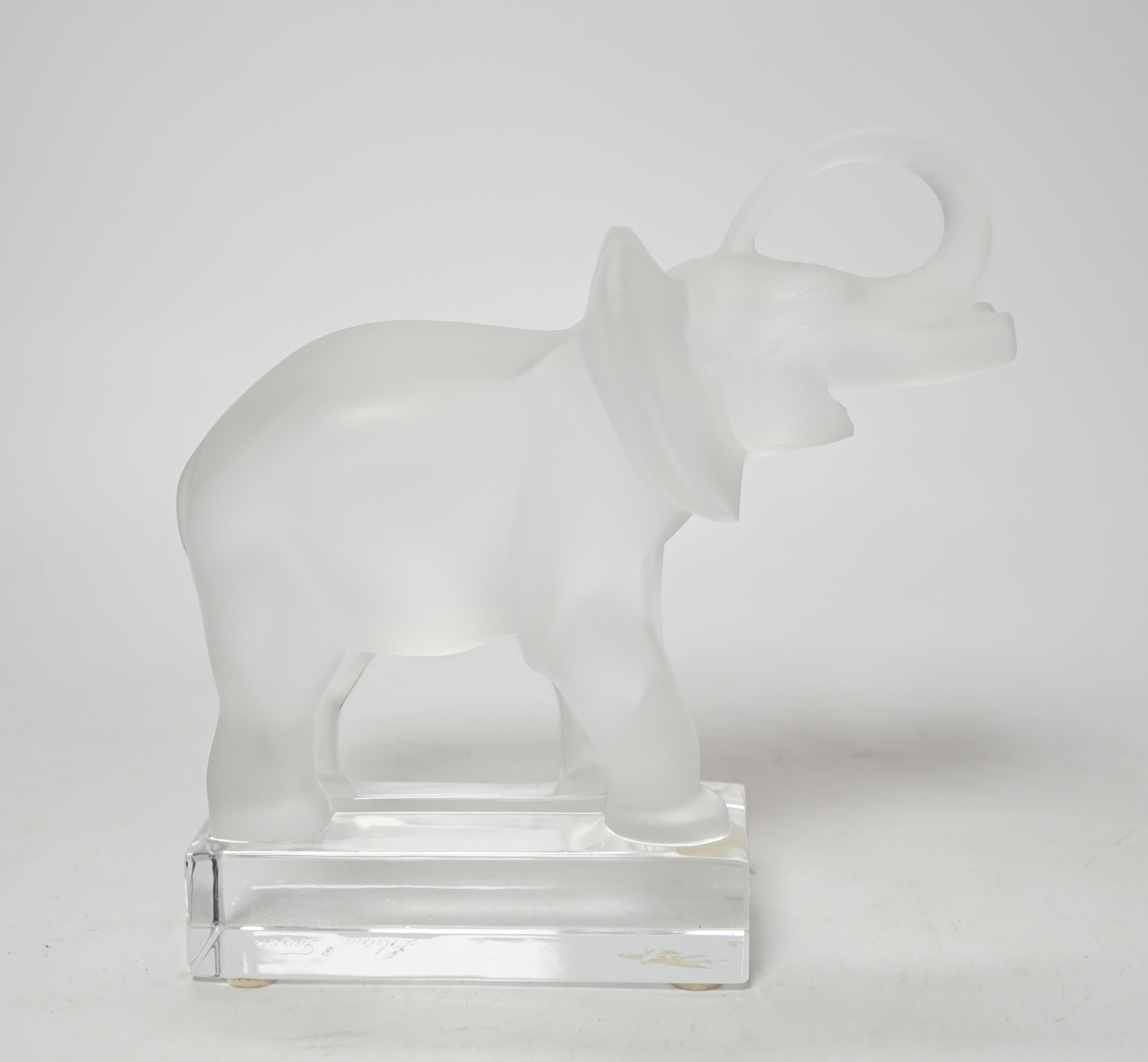 A Lalique frosted glass model of an elephant, signed to the base, 16cm high                                                                                                                                                 