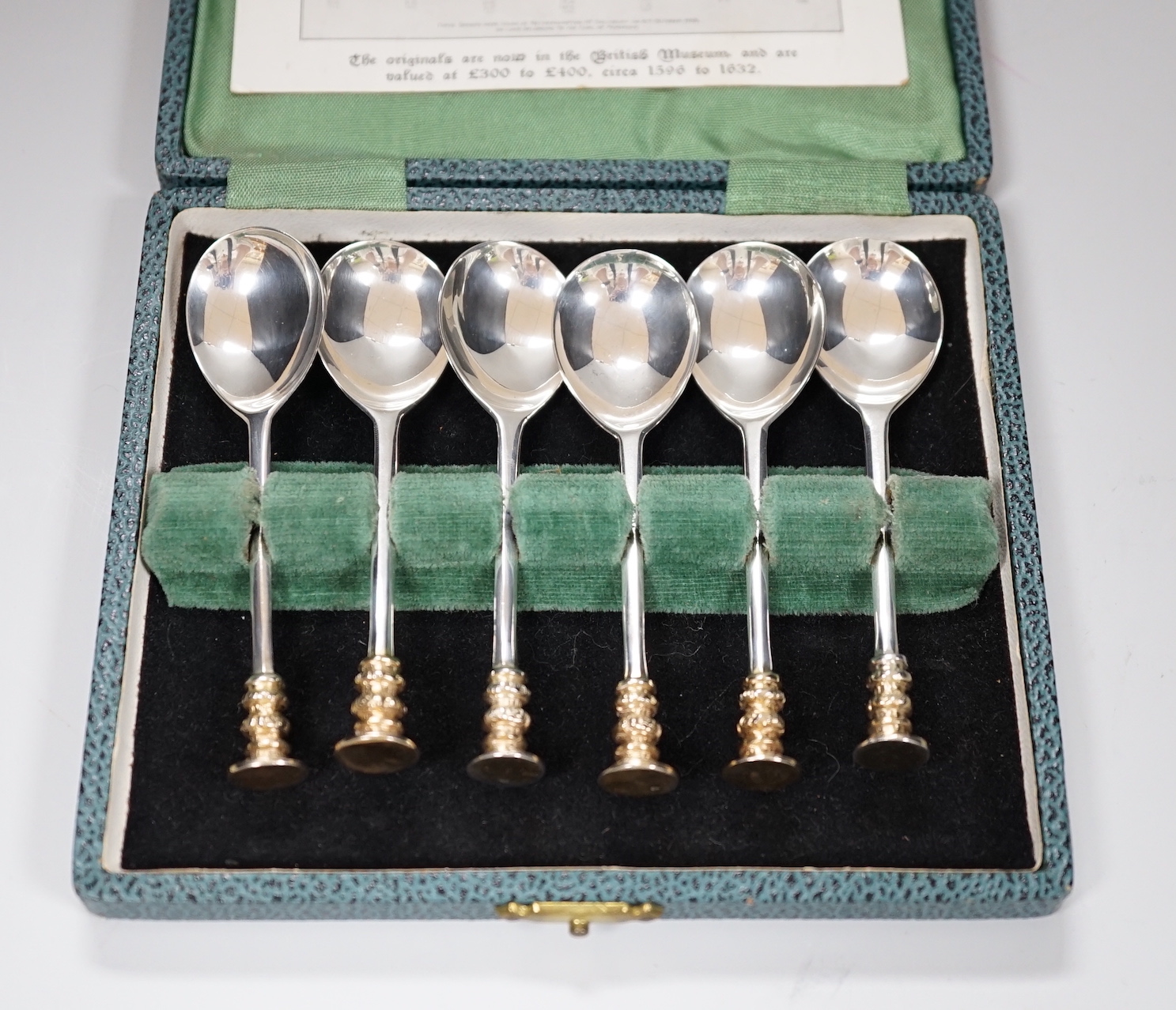 A cased set of six George VI silver Salisbury seal top spoons, with silver gilt finials, London 1944, 92 grams                                                                                                              