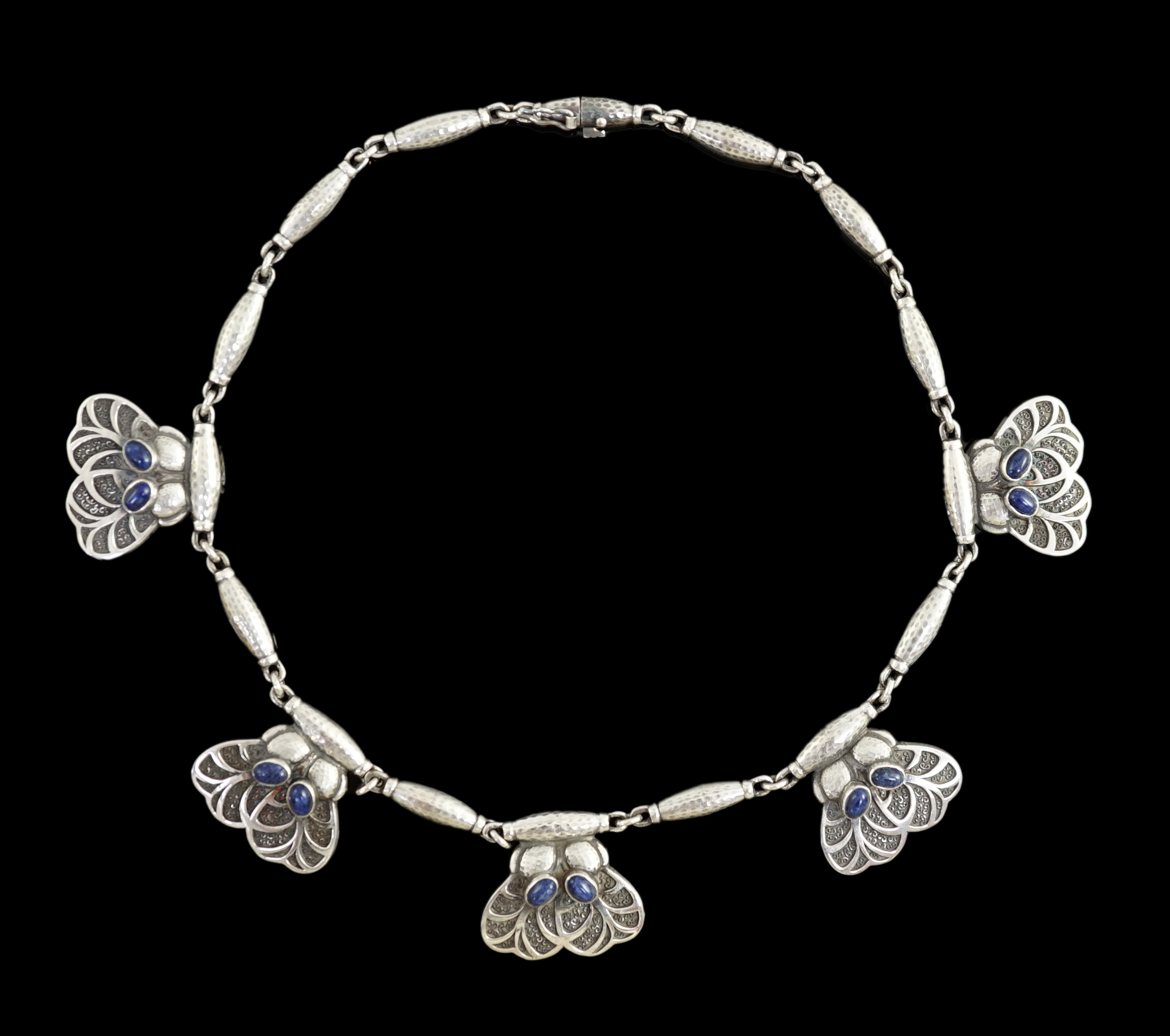 A Georg Jensen planished sterling silver and cabochon blue quartz set necklace, design no. 4                                                                                                                                