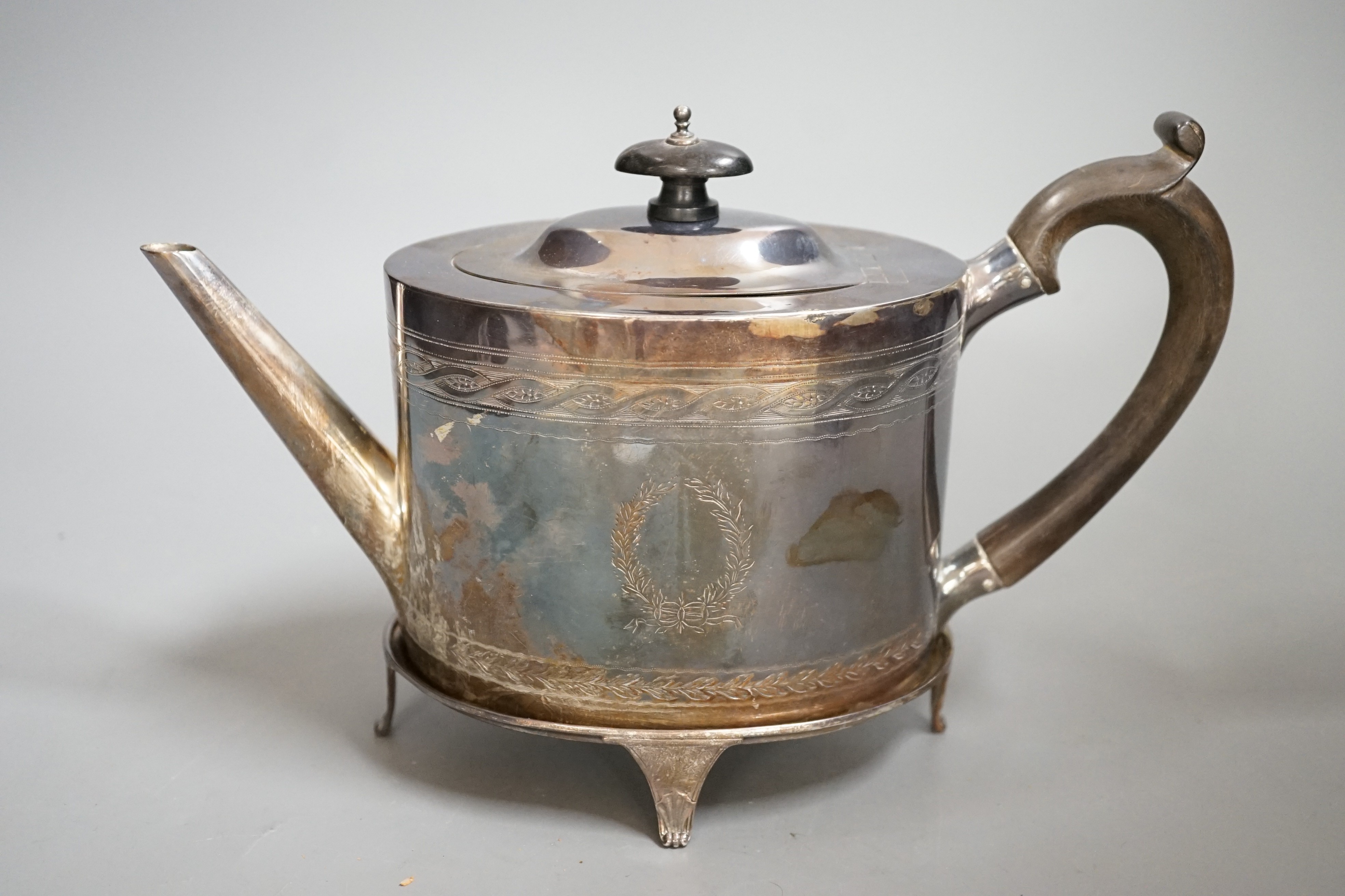 A George V 18th century style silver oval teapot on stand, by Elkington & Co, Birmingham, 1911                                                                                                                              