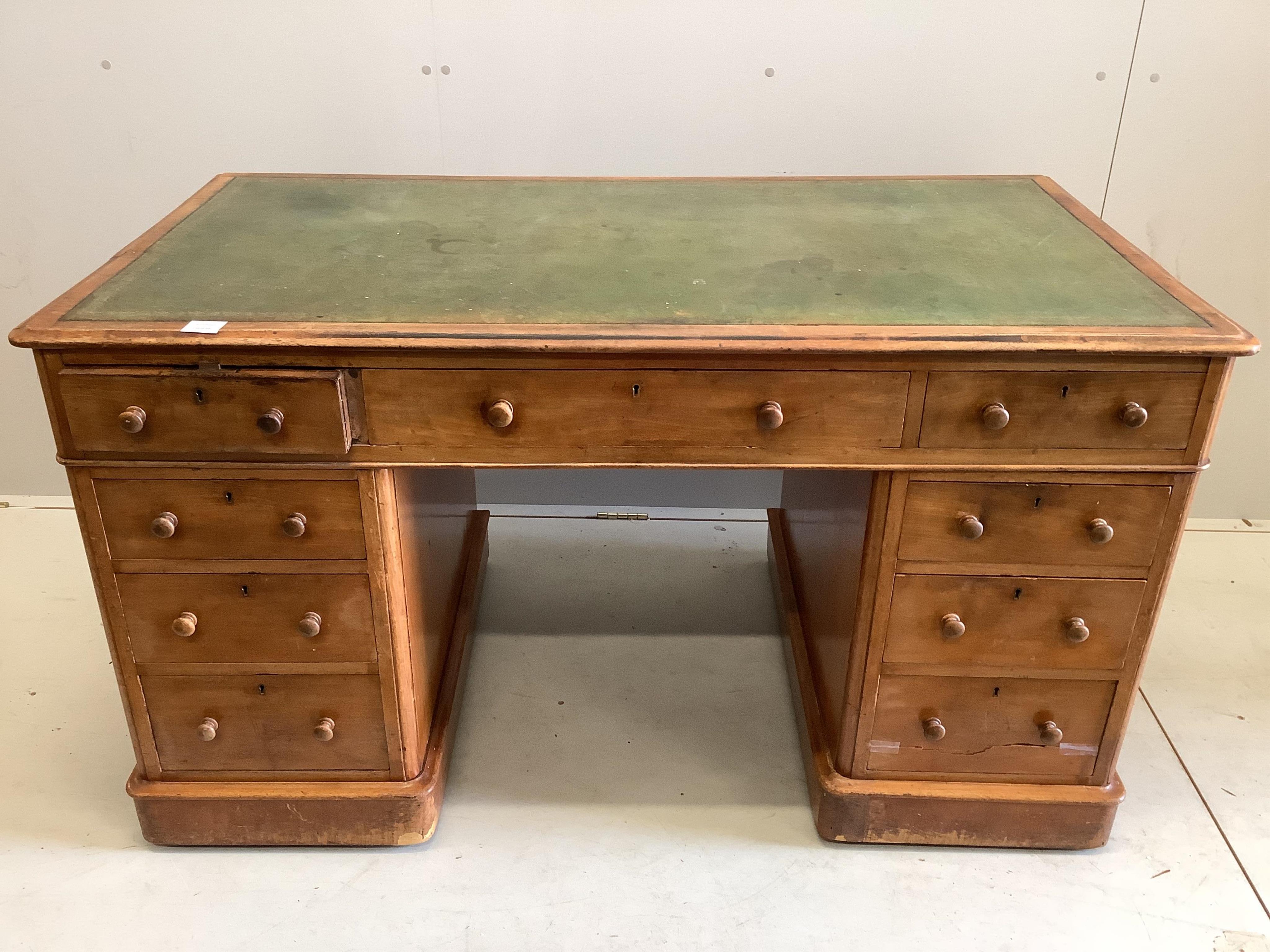 A late Victorian mahogany leather topped pedestal desk, width 138cm, depth 75cm, height 77cm                                                                                                                                