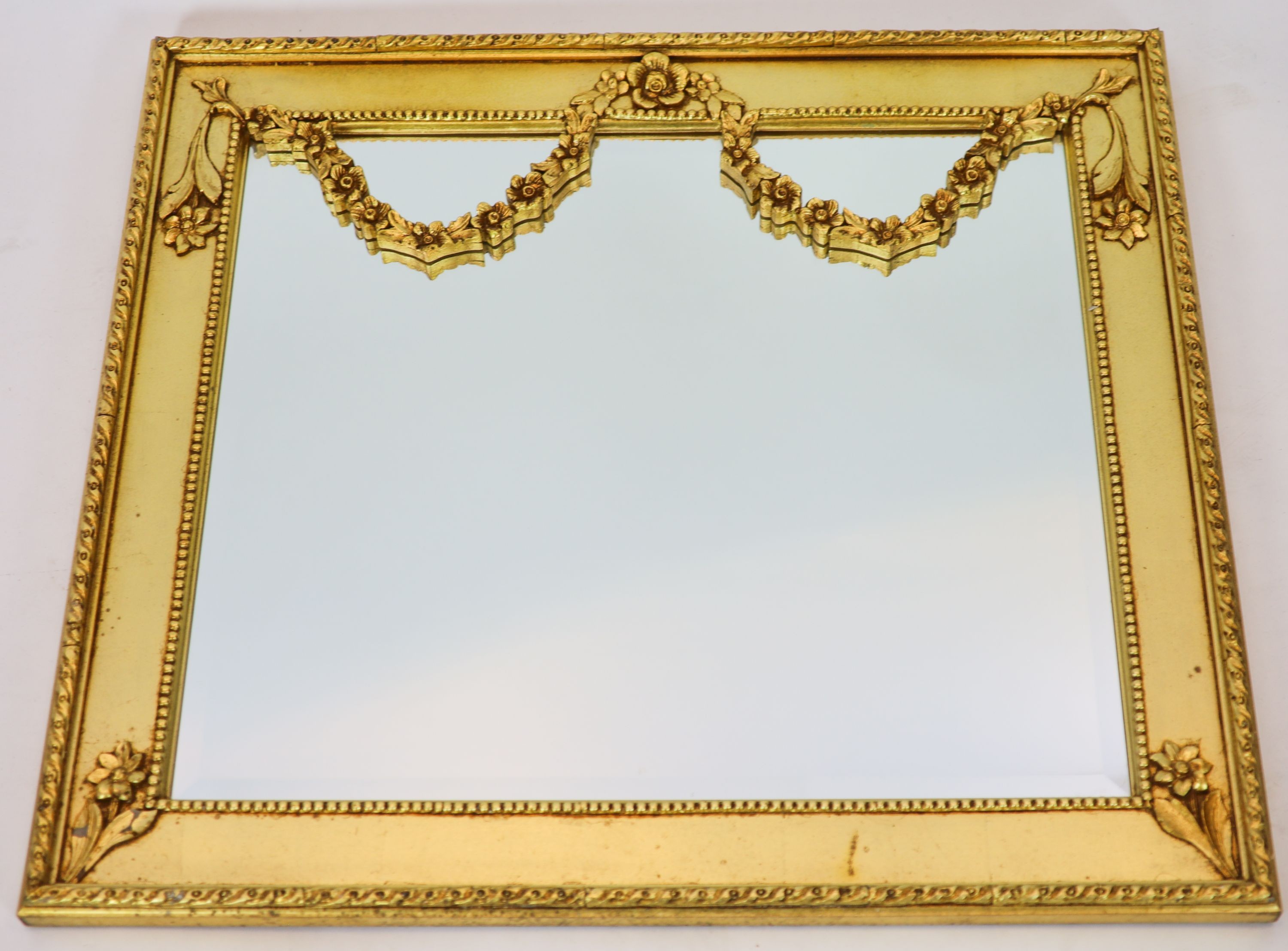 WITHDRAWN, A Louis XVI style rectangular gilt framed wall mirror, width 90cm, height 80cm                                                                                                                                   