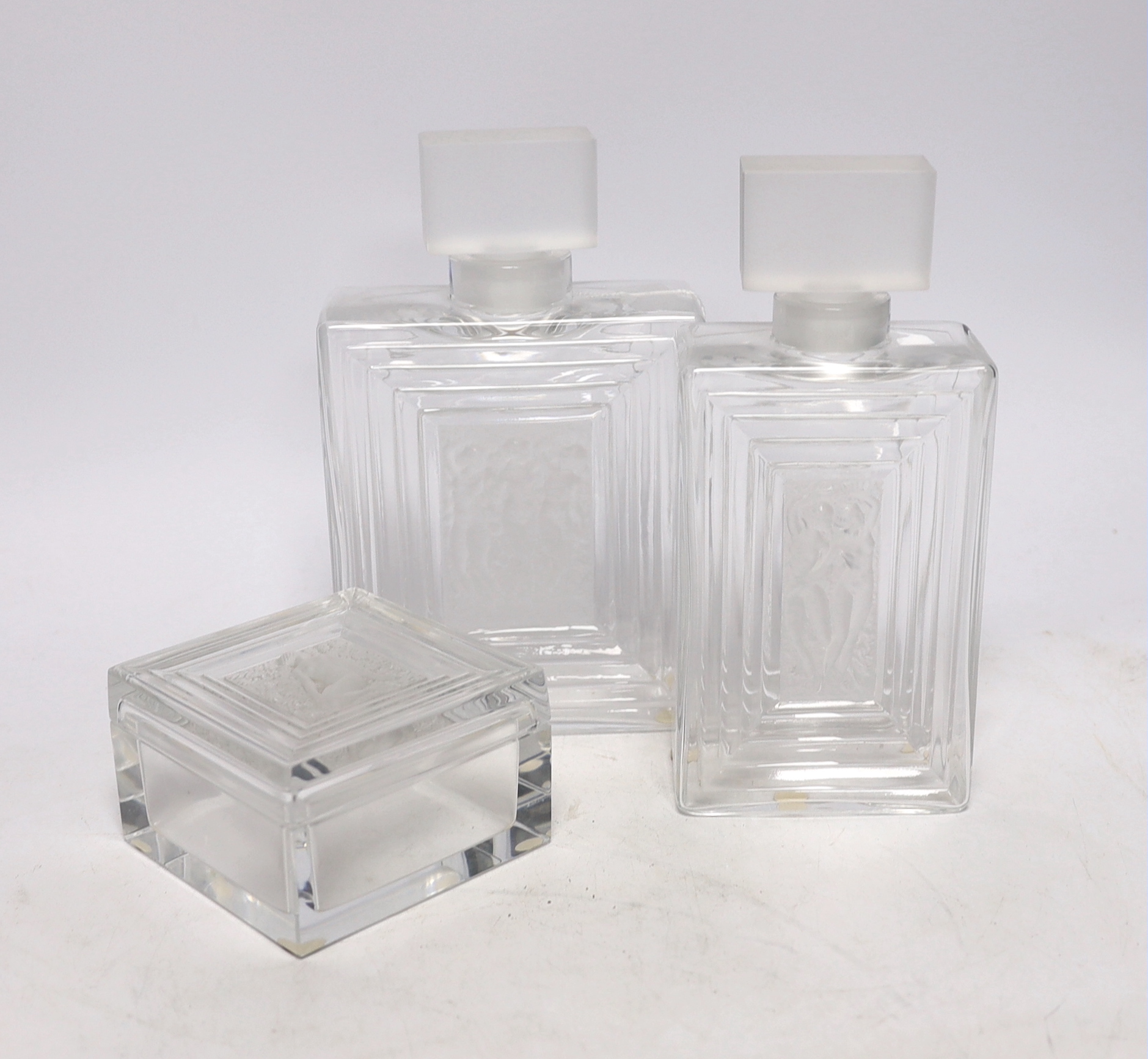 Two Lalique Duncan pattern glass scent bottles and stoppers and a matching toilet box and cover, tallest 20cm                                                                                                               