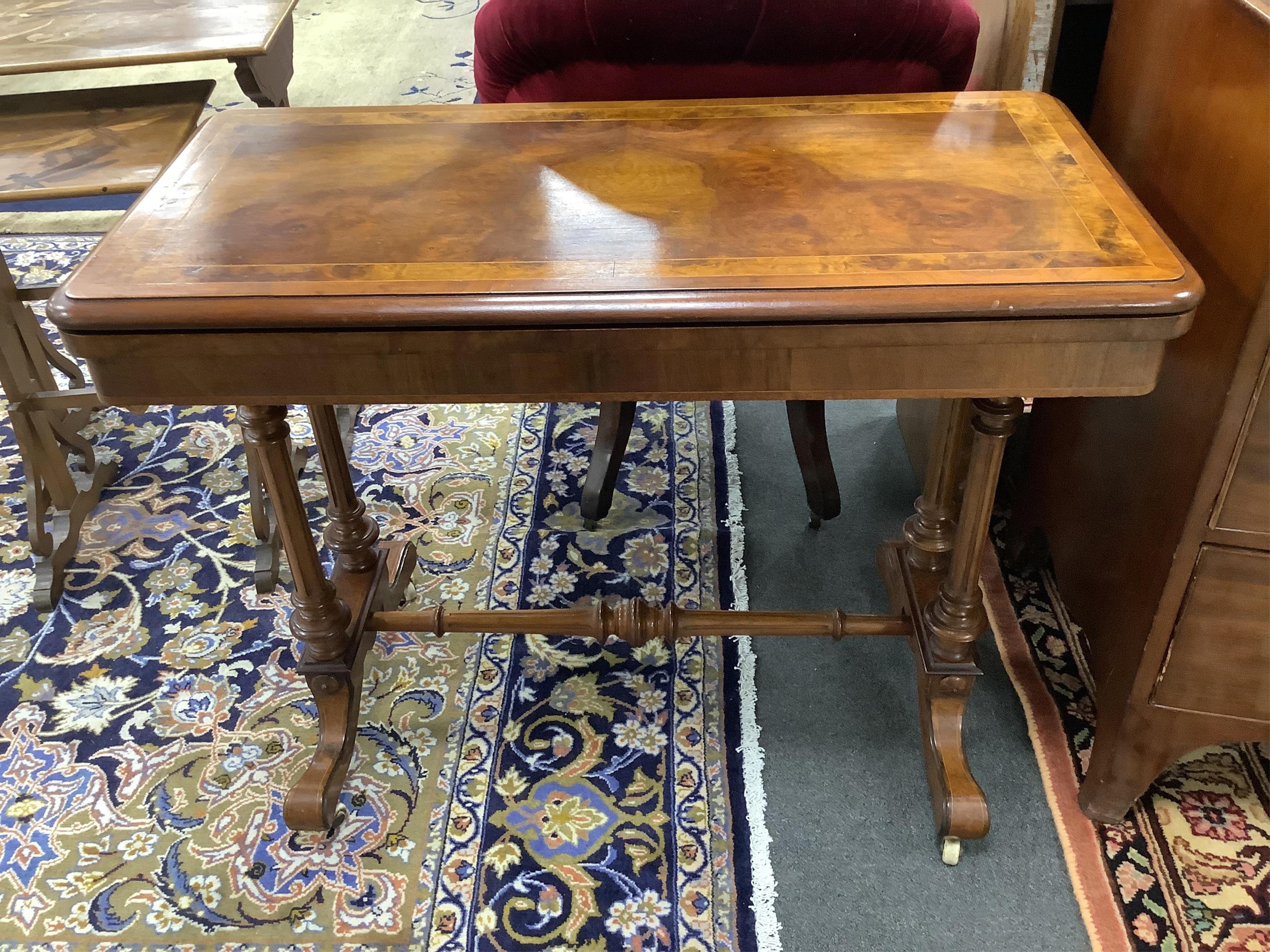 A Victorian walnut card table, width 91cm, depth 45cm, height 71cm. Condition - fair                                                                                                                                        